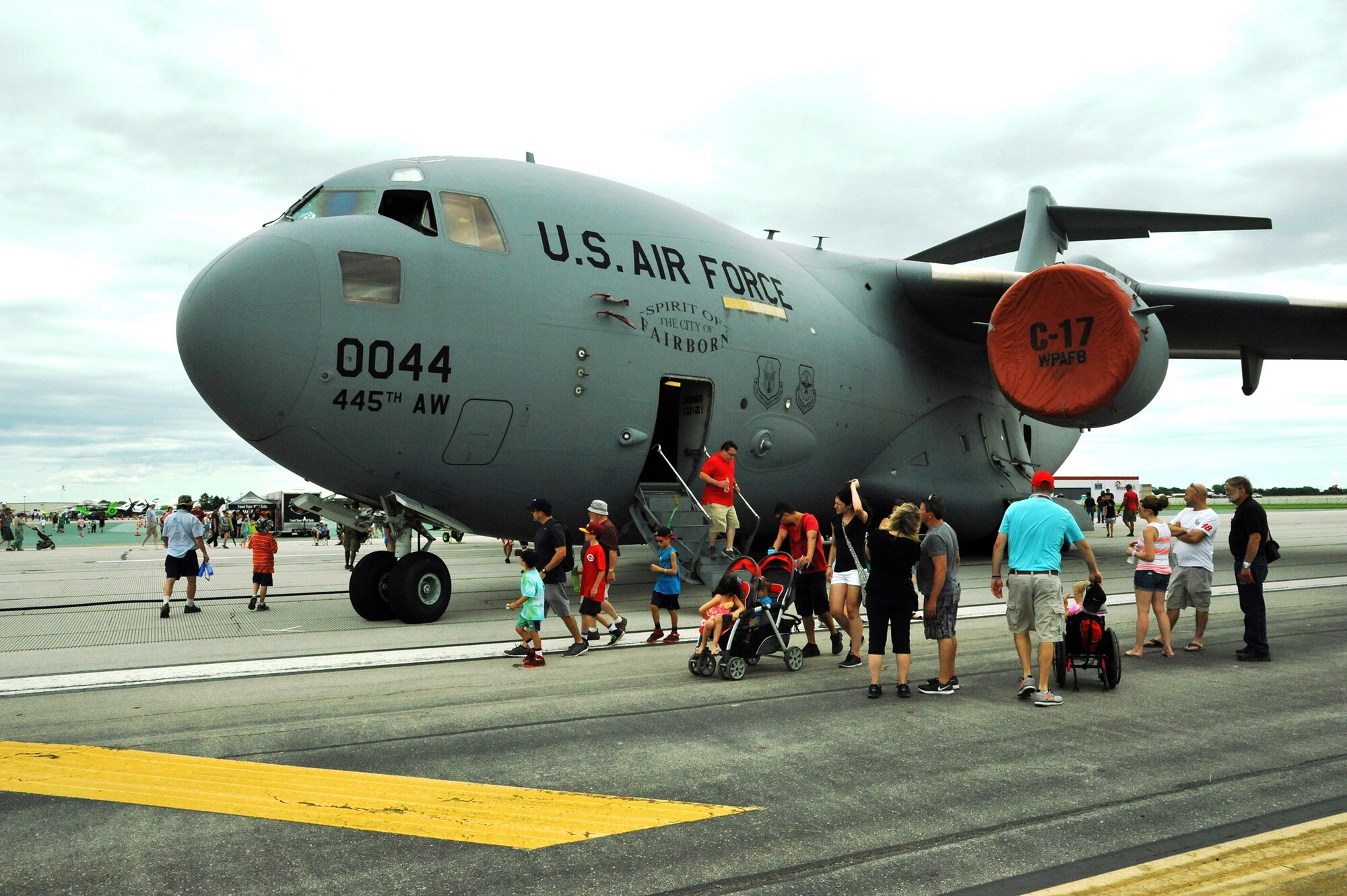 DAYTON, Ohio - Attendees of the 41st annual Vectren Dayton Air Show enjoy touring a 445th Airlift Wing C-17 Globemaster III sitting on the tarmac of the Dayton International Airport June 20-21, 2015. More than 40,000 people were able to see the aircraft from Wright-Patterson Air Force Base, Ohio, up close and personal. (Courtesy photo)