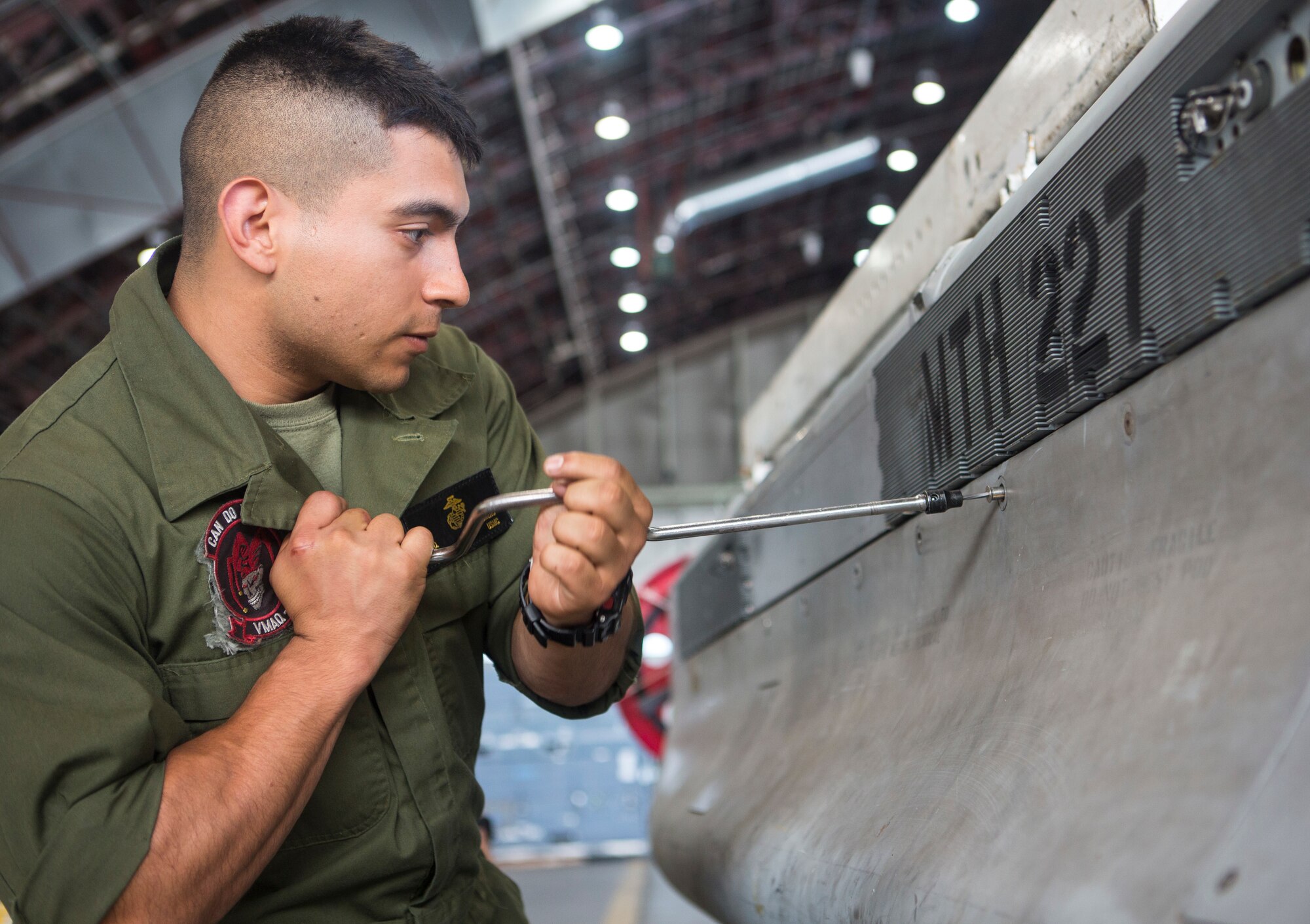 U.S. Marine Corps Cpl. Nestor Romero, Marine Tactical Electronic Warfare Squadron 2, 2nd Marine Aircraft Wing, electronic counter measure systems technician, conducts maintenance on an airborne integrated jamming system for a U.S. Marine Corps EA-6B Prowler during Exercise Northern Edge 15 at Eielson Air Force Base, Alaska, June 18, 2015. Northern Edge is Alaska’s premier joint training exercise designed to practice operations, techniques and procedures as well as enhance interoperability among the services. Thousands of Airmen, Soldiers, Sailors, Marines and Coast Guardsmen from active duty, Reserve and National Guard units are involved. (U.S. Marine Corps photo by Staff Sgt. Jeffrey D. Anderson/ Released)