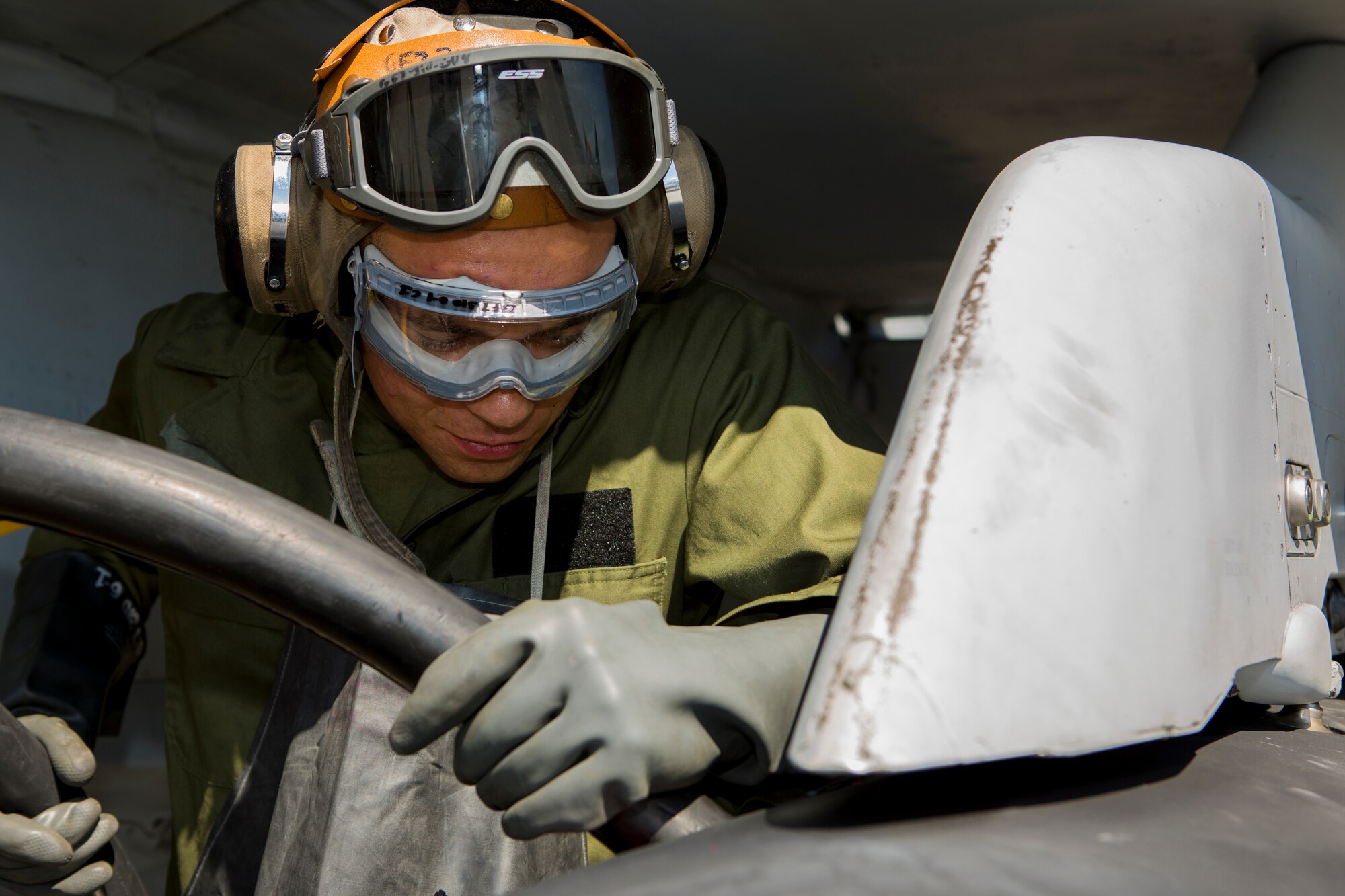 U.S. Marine Corps Lance Cpl. Jori Avaire, Marine All-Weather Fighter Attack Squadron (VMFA [AW]) 242, 1st Marine Aircraft Wing, power liner, refuels a U.S. Marine Corps FA-18D Hornet during Exercise Northern Edge 15 at Eielson Air Force Base, Alaska, June 18, 2015. Northern Edge is Alaska’s premier joint training exercise designed to practice operations, techniques and procedures as well as enhance interoperability among the services. Thousands of Airmen, Soldiers, Sailors, Marines and Coast Guardsmen from active duty, Reserve and National Guard units are involved. (U.S. Marine Corps photo by Cpl. Suzanne Dickson/Released)