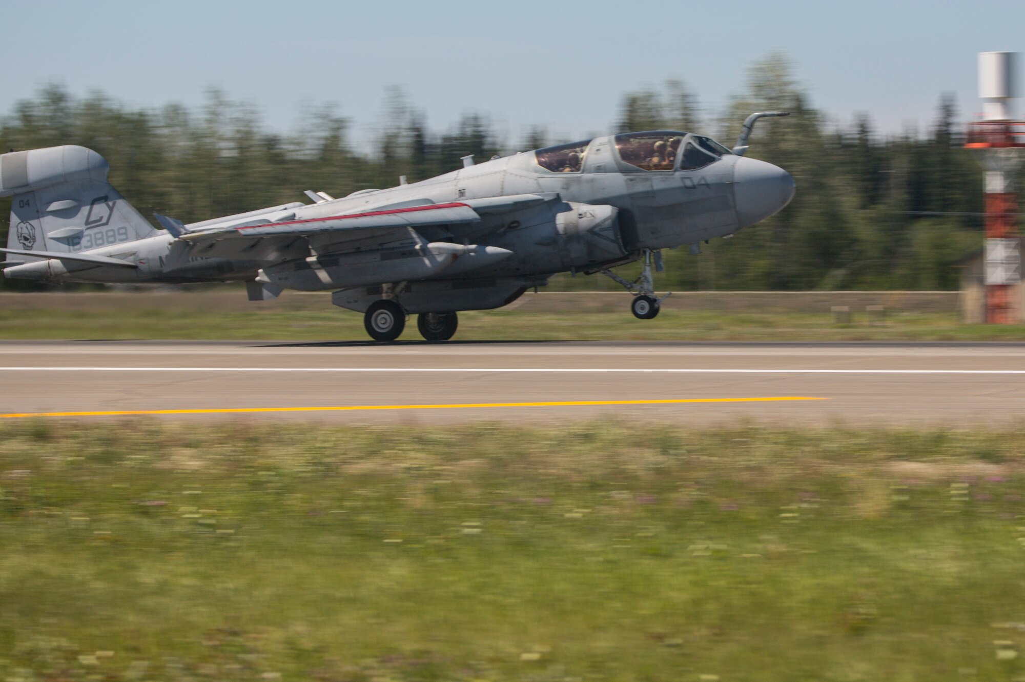A U.S. Marine Corps EA-6B Prowler aircraft assigned to Marine Tactical Electronic Warfare Squadron 2, 2nd Marine Aircraft Wing, lands at Eielson Air Force Base, Alaska, June 18, 2015, following a training mission during Exercise Northern Edge 2015. Northern Edge is Alaska’s premier joint training exercise designed to practice operations, techniques and procedures as well as enhance interoperability among the services. Thousands of Airmen, Soldiers, Sailors, Marines and Coast Guardsmen from active duty, Reserve and National Guard units are involved. (U.S. Marine Corps photo by Staff Sgt. Jeffrey D. Anderson/ Released)
