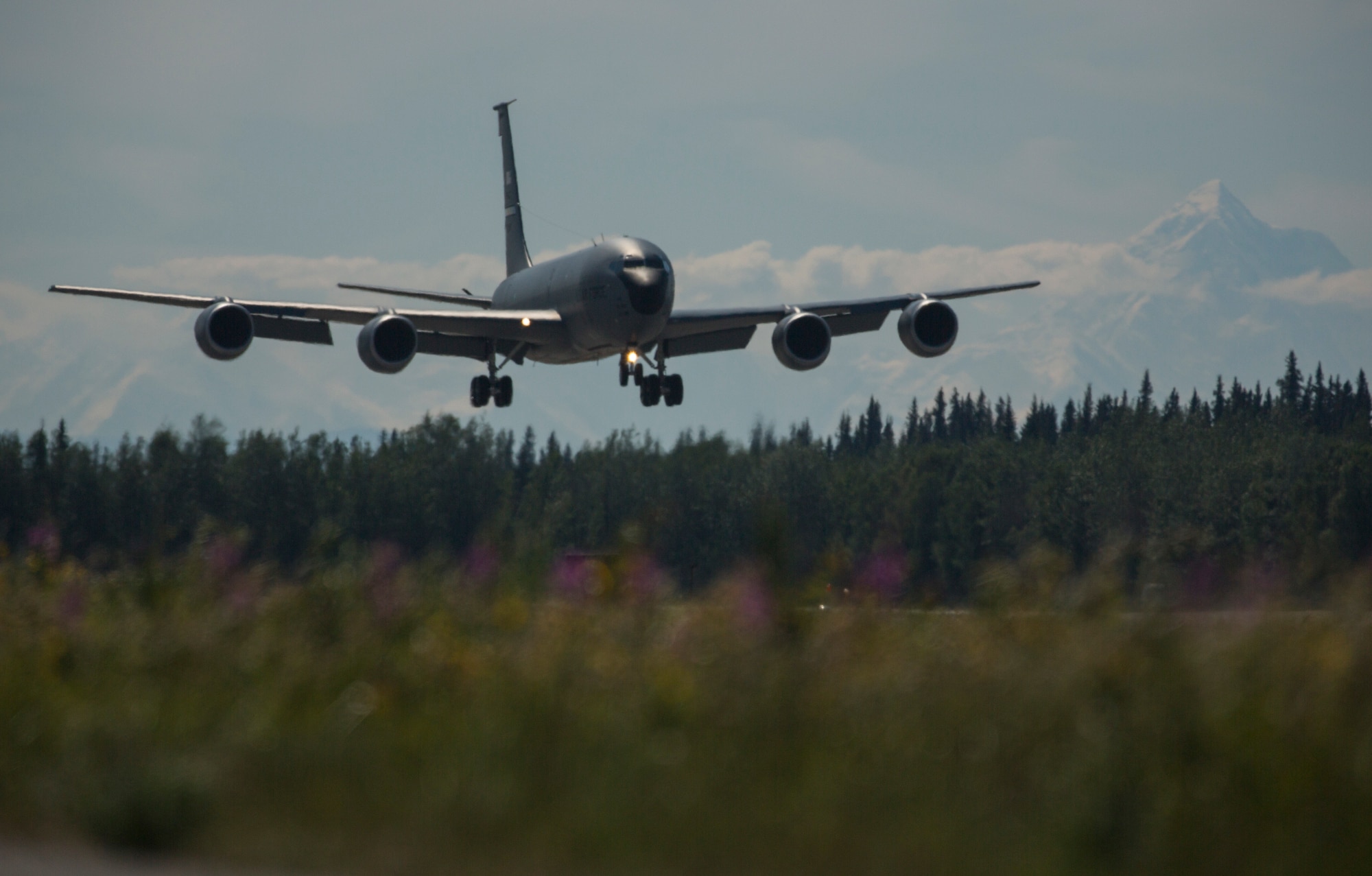 A U.S. Air Force KC-135 Stratotanker, assigned to the 507th Air Refueling Wing, Tinker Air Force Base, Okla., lands at Eielson Air Force Base, Alaska, June 18, 2015, following a training mission during Exercise Northern Edge 2015. Northern Edge is Alaska’s premier joint training exercise designed to practice operations, techniques and procedures as well as enhance interoperability among the services. Thousands of Airmen, Soldiers, Sailors, Marines and Coast Guardsmen from active duty, Reserve and National Guard units are involved. (U.S. Marine Corps photo by Staff Sgt. Jeffrey D. Anderson/ Released)