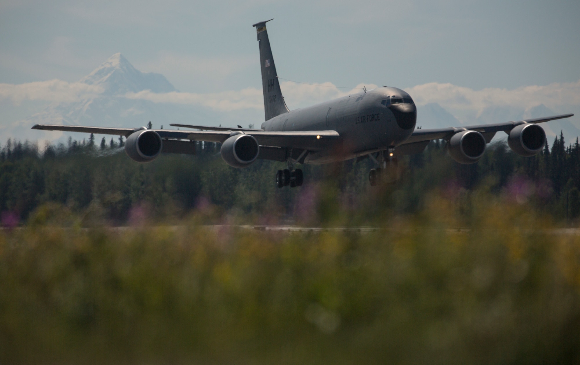 A U.S. Air Force KC-135 Stratotanker, assigned to the 507th Air Refueling Wing, Tinker Air Force Base, Okla., lands at Eielson Air Force Base, Alaska, June 18, 2015, following a training mission during Exercise Northern Edge 2015. Northern Edge is Alaska’s premier joint training exercise designed to practice operations, techniques and procedures as well as enhance interoperability among the services. Thousands of Airmen, Soldiers, Sailors, Marines and Coast Guardsmen from active duty, Reserve and National Guard units are involved. (U.S. Marine Corps photo by Staff Sgt. Jeffrey D. Anderson/ Released)