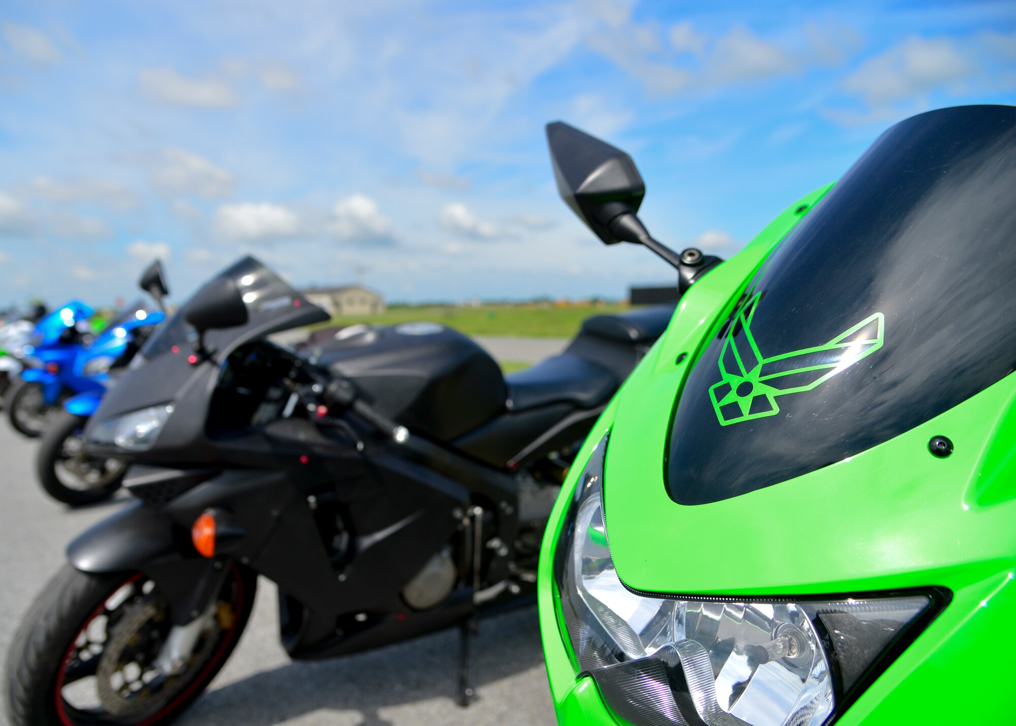 Motorcycles are parked in a line at Motorcycle Safety Day June 19, 2015, at Dover Air Force Base, Del. The 10th Annual Motorcycle Safety Day was hosted by the 436th Airlift Wing Safety Office and was held to help develop riders’ skills, awareness and community involvement. (U.S. Air Force photo/Airman 1st Class William Johnson)