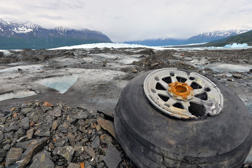 Landing gear from a 1952 C-124 Globemaster II aircraft accident rests on top of Colony Glacier June 10, 2015. Each summer since 2012 Alaskan Command has supported Operation Colony Glacier by removing aircraft debris and assisting in the recovery of human remains to ensure closure for families who have lost loved ones. (U.S. Air Force photo/Tech. Sgt. John Gordinier)