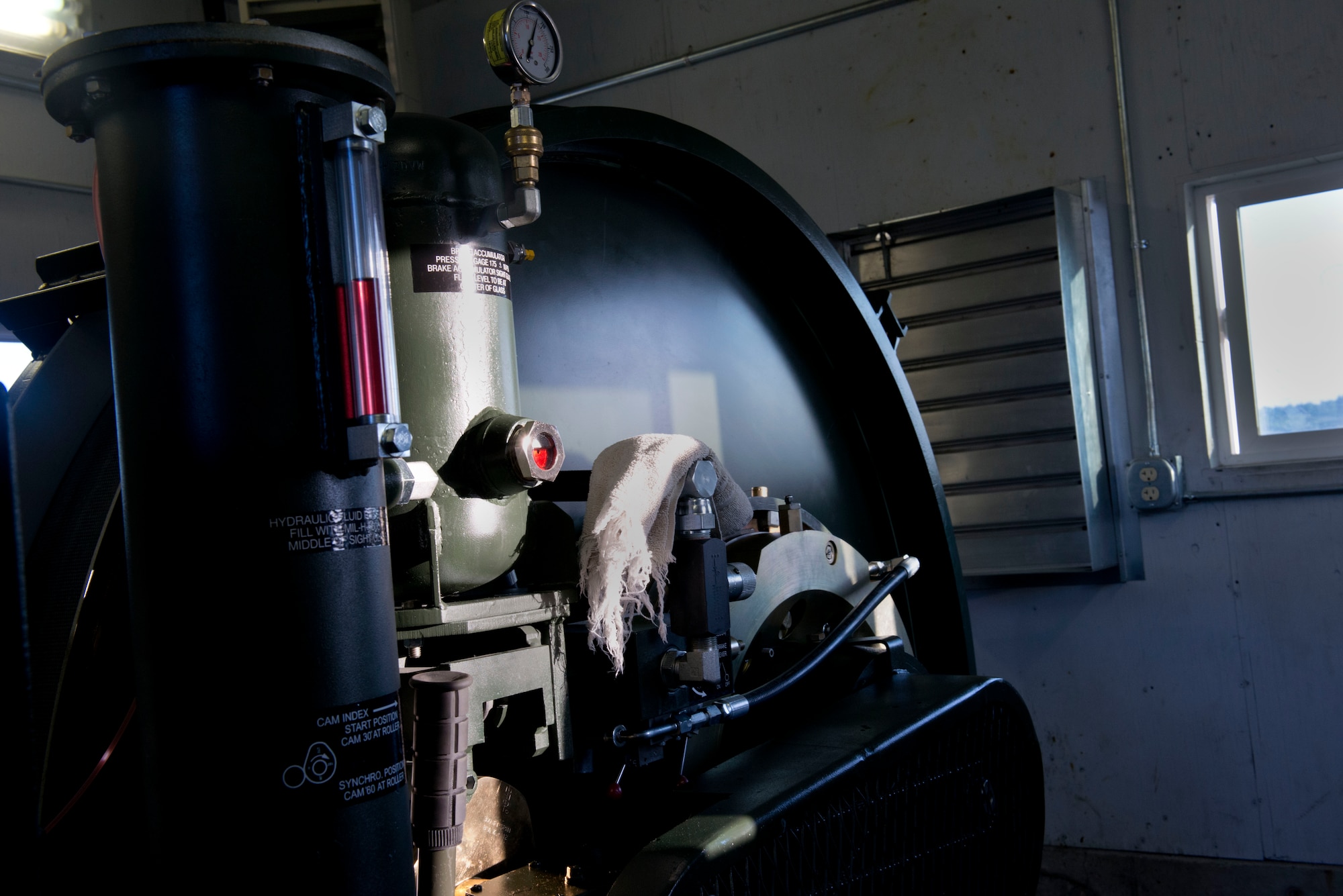 This 66-inch reel holds the nylon tape attached to the steel cable an aircraft's tailhook would grab in the event of an emergency; it is one part of the BAK-12 aircraft arresting system. The BAK-12s on the flightline of Joint Base Elmendorf-Richardson are designed to bring out-of-control aircraft to a safe stop with minimal damage. (U.S. Air Force photo/Airman 1st Class Kyle Johnson)