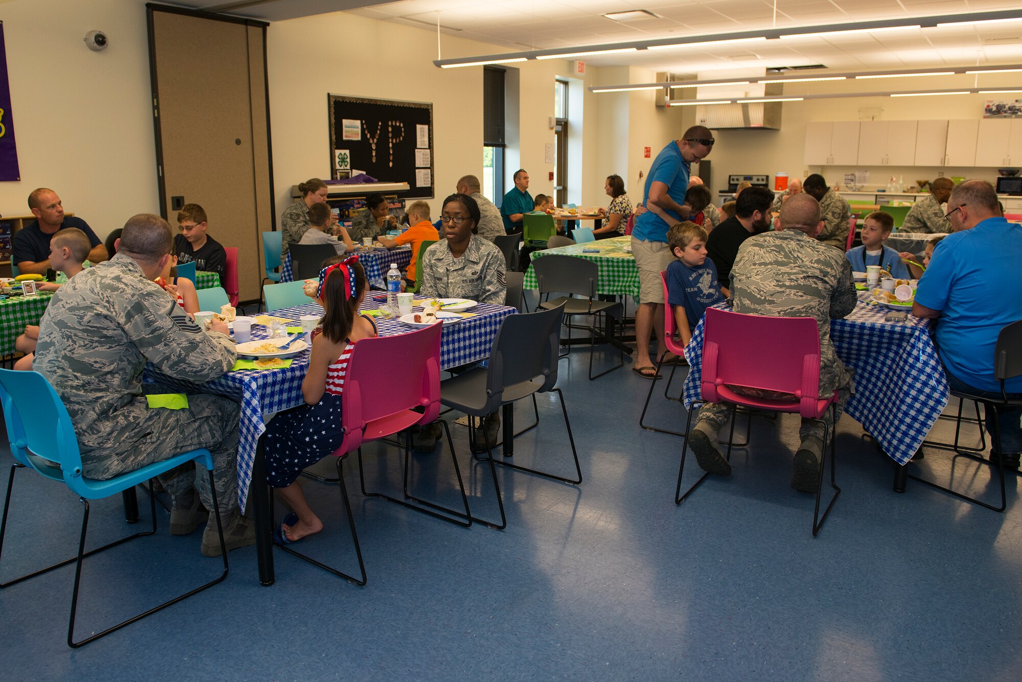 Families eat during the Youth Program’s Father’s Day Breakfast June 19, 2015, at Moody Air Force Base, Ga. The Youth Center held the breakfast to give the children a chance to show their fathers appreciation. (U.S. Air Force photo by Airman 1st Class Kathleen D. Bryant/Released)