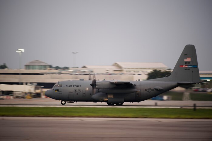 Aircrew flying a modified C-130 Hercules assigned to the 910th Airlift Wing, Youngstown Air Reserve Station, Ohio, prepares to take off June 19, 2015, at Joint Base Charleston, South Carolina. The C-130 Hercules and crew sprayed to eradicate mosquitos on the Joint Base Charleston Weapons Station and is the only unit of its kind. The crew performed aerial spraying at night to increase the chances of eliminating mosquitoes while reducing the risk of contaminating bees.  (U.S. Air Force photo/Senior Airman Jared Trimarchi)
