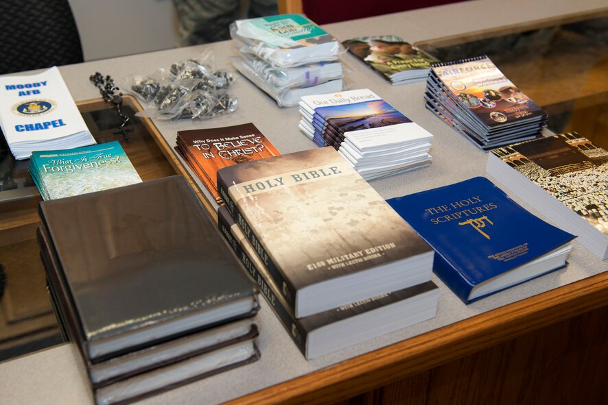 Religious material rests on a counter during a deployment briefing June 18, 2015, at Moody Air Force Base, Ga. Chaplains offered Airmen in attendance religious material to take with them on deployments. (U.S. Air Force photo by Airman 1st Class Kathleen D. Bryant/Released)