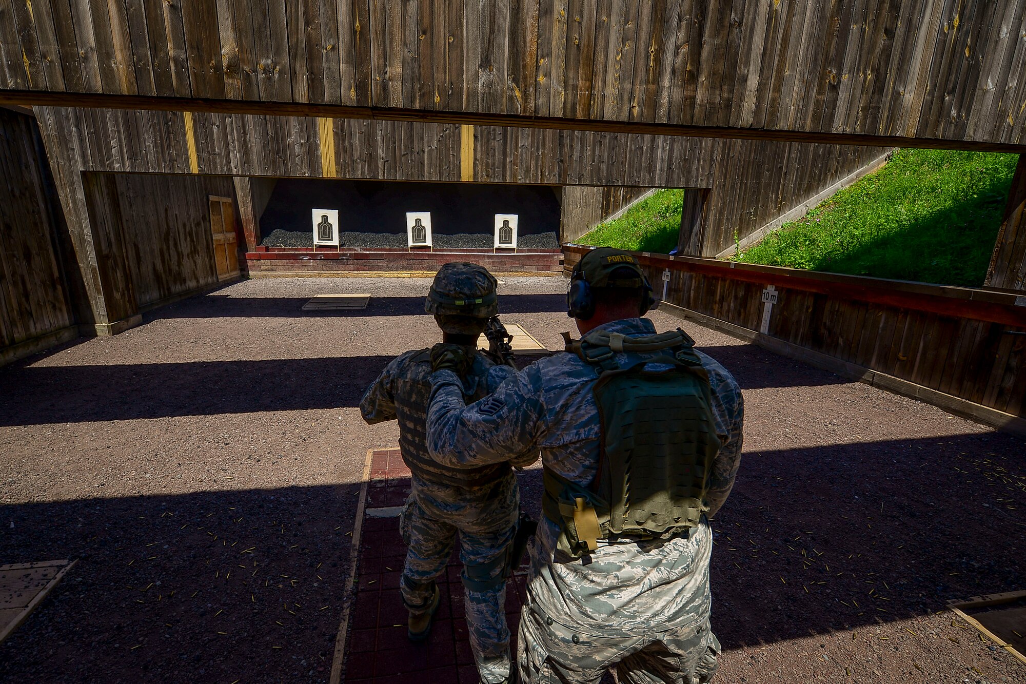 A Creek Defender instructor prepares the firing line during live-fire, stress-fire training on Baumholder, Germany, June 18, 2015.  The firing line is cleared by an instructor to ensure the students are safe when firing.  Live-fire, stress-fire training is one of 24 SF core tasks that must be completed during the base security operations course and gives students a realistic work environment for future operations while deployed. The students fire with no stress, then fire after completing strenuous exercises until fatigued.  (U.S. Air Force photo/Tech. Sgt. Daylena S. Ricks)