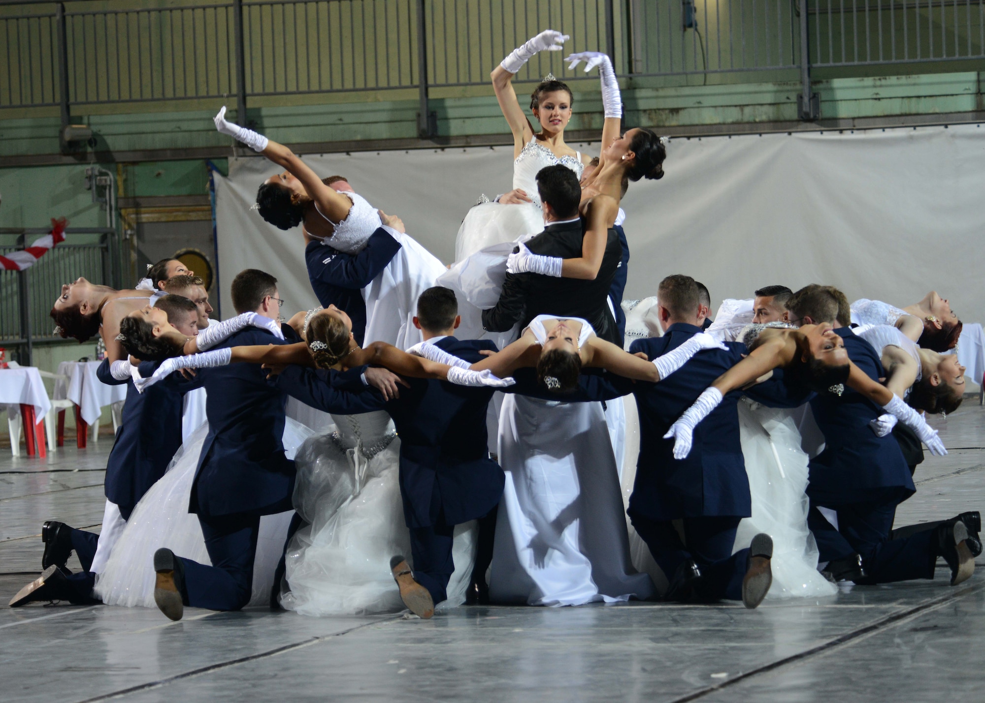 Participants of the 17th Annual Debutant Ball perform a dance routine, June 21, 2015, in Cordenons, Italy. The ball dates back to the late 1800s where 18-year-old women, or debutants, reached the age of adulthood and were introduced into local society at a formal presentation. (U.S. Air Force photo by Airman 1st Class Deana Heitzman/Released)
