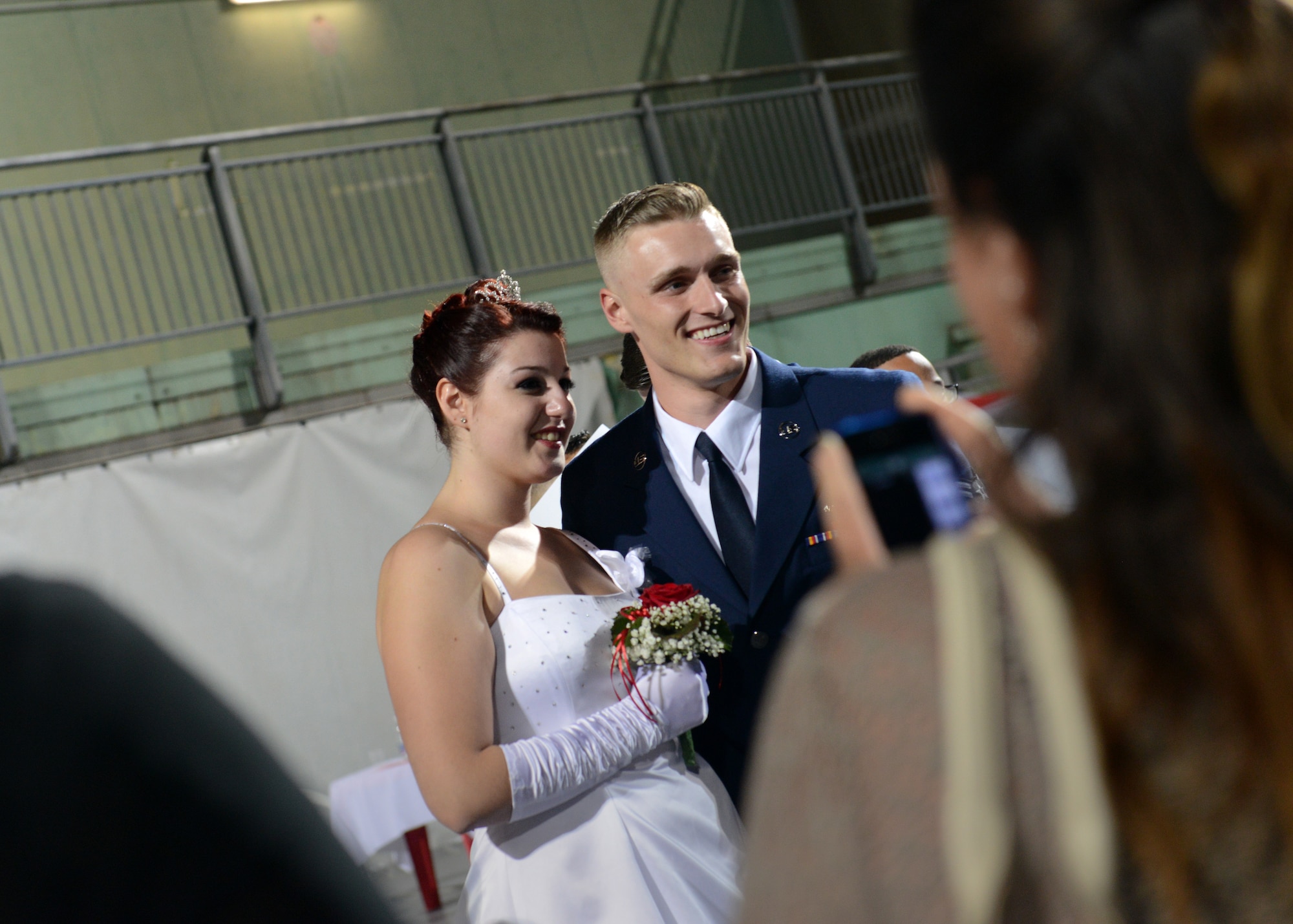 U.S. Air Force Airman 1st Class Gabriel Schaffner, 31st Force Support Squadron career enhancement journeyman, poses for a photo with his partner, Alice, after the 17th Annual Debutant Ball, June 21, 2014, in Cordenons, Italy.  Airmen from the 31st Fighter Wing have participated in the event for the past five years. Thirteen Wyverns volunteered for this year’s ball as escort and dance partners for the debutants. (U.S. Air Force photo by Airman 1st Class Deana Heitzman/Released) 