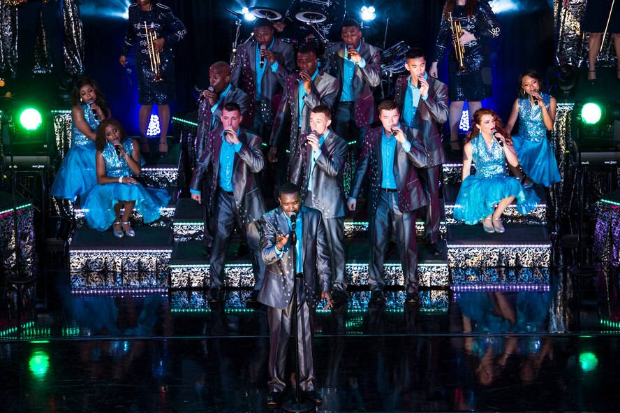 Tops in Blue entertainers perform a coordinated dance routine during a performance June 12, 2015, at Wild Adventures in Valdosta, Ga.  Valdosta was the second stop on the seven-month 2015 Tops in Blue world tour. (U.S. Air Force photo by Senior Airman Ryan Callaghan/Released)
