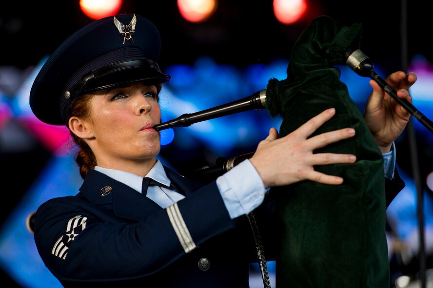 U.S. Air Force Staff Sgt. Marissa Strickland, Tops in Blue performer, plays the bagpipes during a performance June 12, 2015, at Wild Adventures in Valdosta, Ga. Strickland is a cryptologic linguist at the 392d Intelligence Squadron. (U.S. Air Force photo by Senior Airman Ryan Callaghan/Released)
