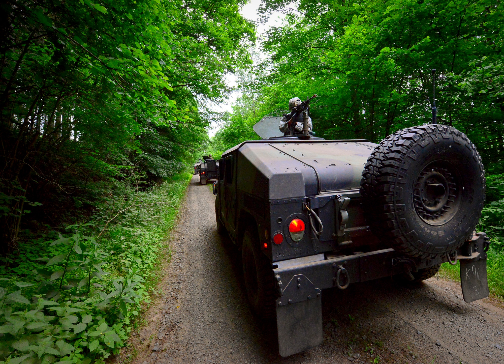 Airman 1st Class Nigel Cruddington, 100th Security Forces Squadron journeyman, provides heavy weapon support on Baumholder, Germany, June 15, 2015.  Heavy gunners are responsible for providing weapon support and security for the team.  (U.S. Air Force Photo/Tech. Sgt. Daylena S. Ricks)