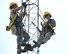 Airman 1st Class Mark Dunton (left) and Senior Airman Samantha Maquillan work on upgrading lightning protection and grounding on a communications tower at Pease Air National Guard Base, N.H., on June 22, 2015. The installation of the lightning protection gear helps protect resources such as radios that 157th Air Refueling Wing Airmen use to support the mission. The Airmen are assigned to the 243rd Engineering Installation Squadron, Maine Air National Guard in South Portland, Maine.  (U.S. Air National Guard photo by Staff Sgt. Curtis J. Lenz)