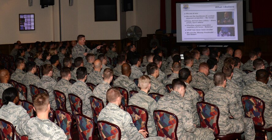 U.S. Air Force Col. Thomas D. Torkelson, 100th Air Refueling Wing commander, speaks to Team Mildenhall members during a commander's call June 23, 2015, on RAF Mildenhall, England. Torkelson received his commission in 1992 after graduating from the U.S. Air Force Academy. (U.S. Air Force photo by Gina Randall/Released)