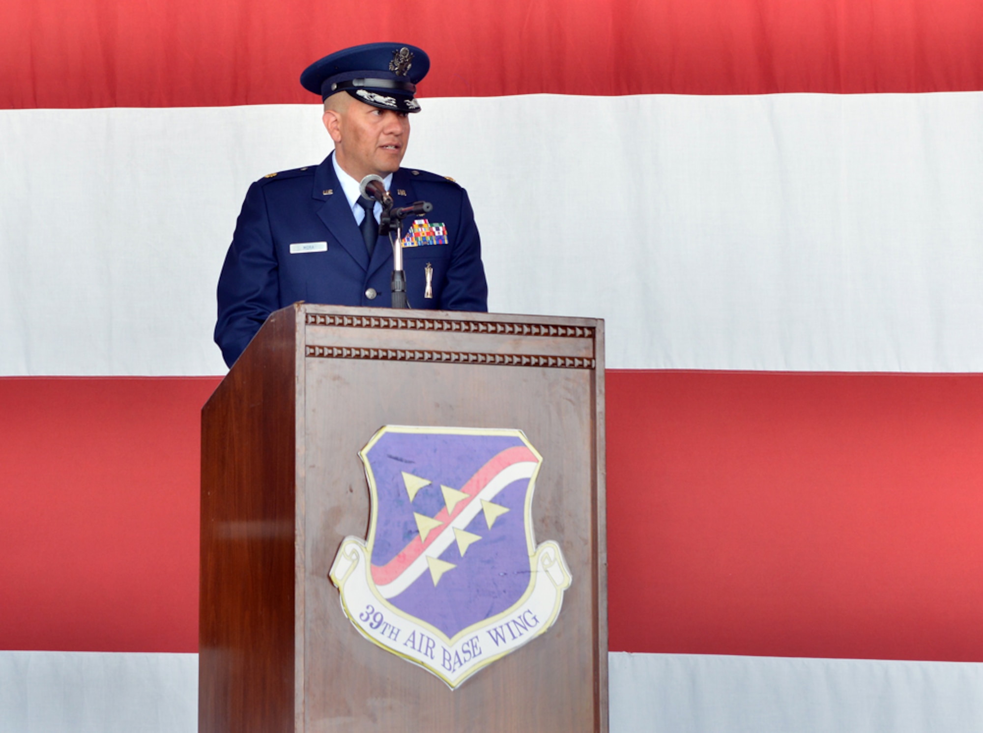 Maj. John Mora, 39th Maintenance Squadron commander, speaks to those in attendance after taking command during the 39th MXS change of command ceremony June 23, 2015, at Incirlik Air Base, Turkey. The 39th MXS supports the 39th ABW, U.S., NATO and U.S. European Command Southern Region with intermediate-level aircraft maintenance, conventional munitions and war reserve material in support of overseas contingency operations.  (U.S. Air Force photo by Senior Airman Michael Battles/Released)