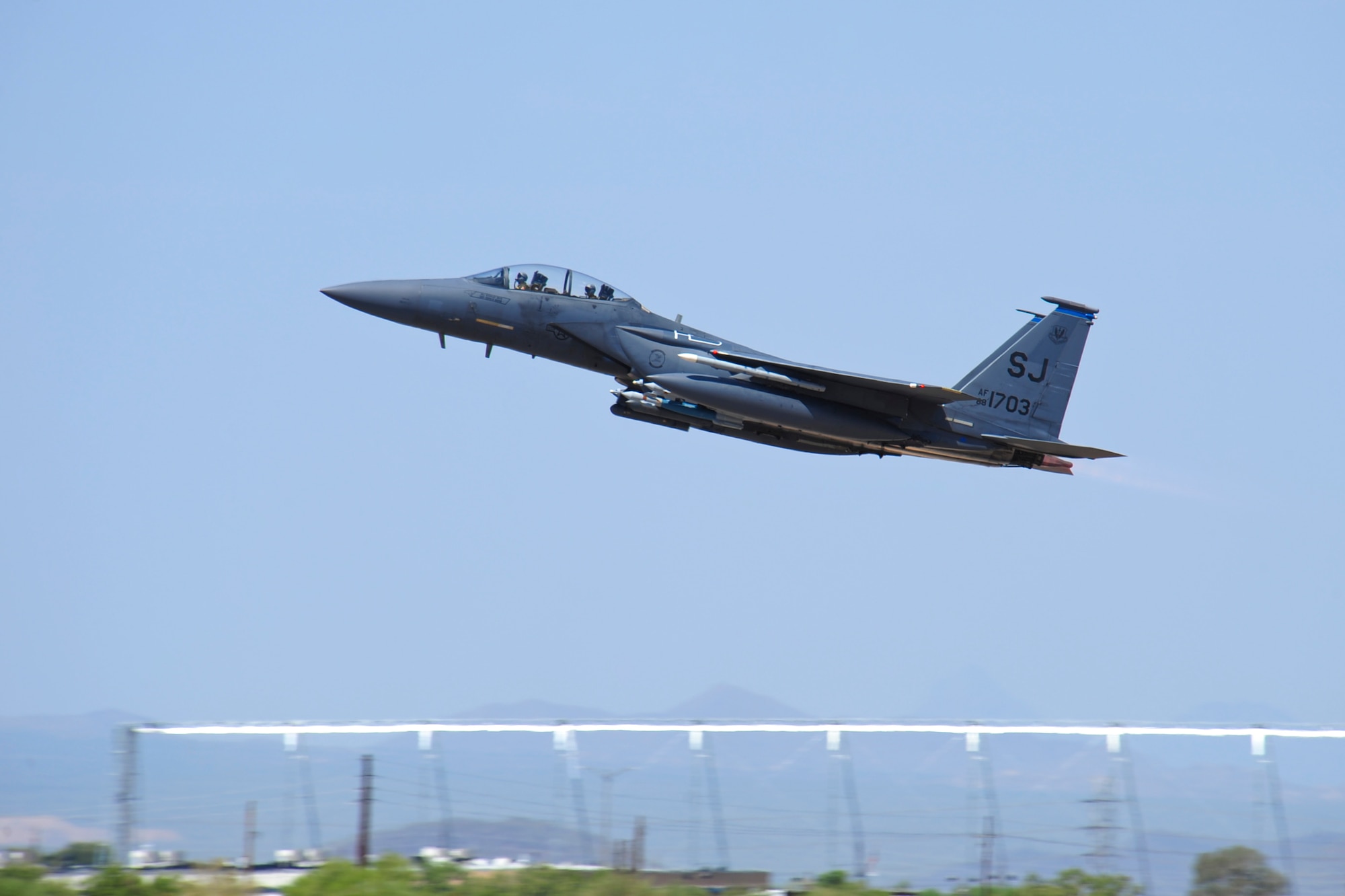 An F-15E Strike Eagle from the 334th Fighter Squadron, Seymour Johnson Air Force Base N.C., takes off from the runway at Davis-Monthan AFB, Ariz., June 22, 2015. Fourteen F-15E Strike Eagles from Seymour Johnson AFB trained with F-35A Lightning IIs, F-16 Fighting Falcons and A-10 Thunderbolt IIs throughout southern Arizona’s military operating areas. (U.S. Air Force photo by Airman 1st Class Chris Massey/Released)