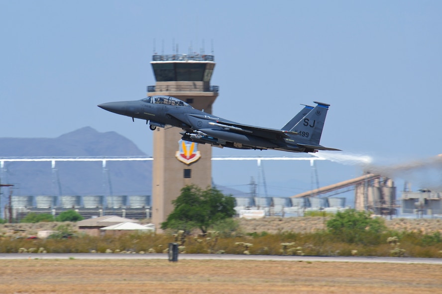 An F-15E Strike Eagle from the 334th Fighter Squadron, Seymour Johnson Air Force Base N.C., takes off from the runway at Davis-Monthan AFB, Ariz., June 22, 2015. Southern Arizona’s military operating areas allowed Strike Eagle pilots to train in unfamiliar terrain with F-35 Lightning IIs, F-16 Fighting Falcons and A-10 Thunderbolt IIs.  (U.S. Air Force photo by Airman 1st Class Chris Massey/Released)