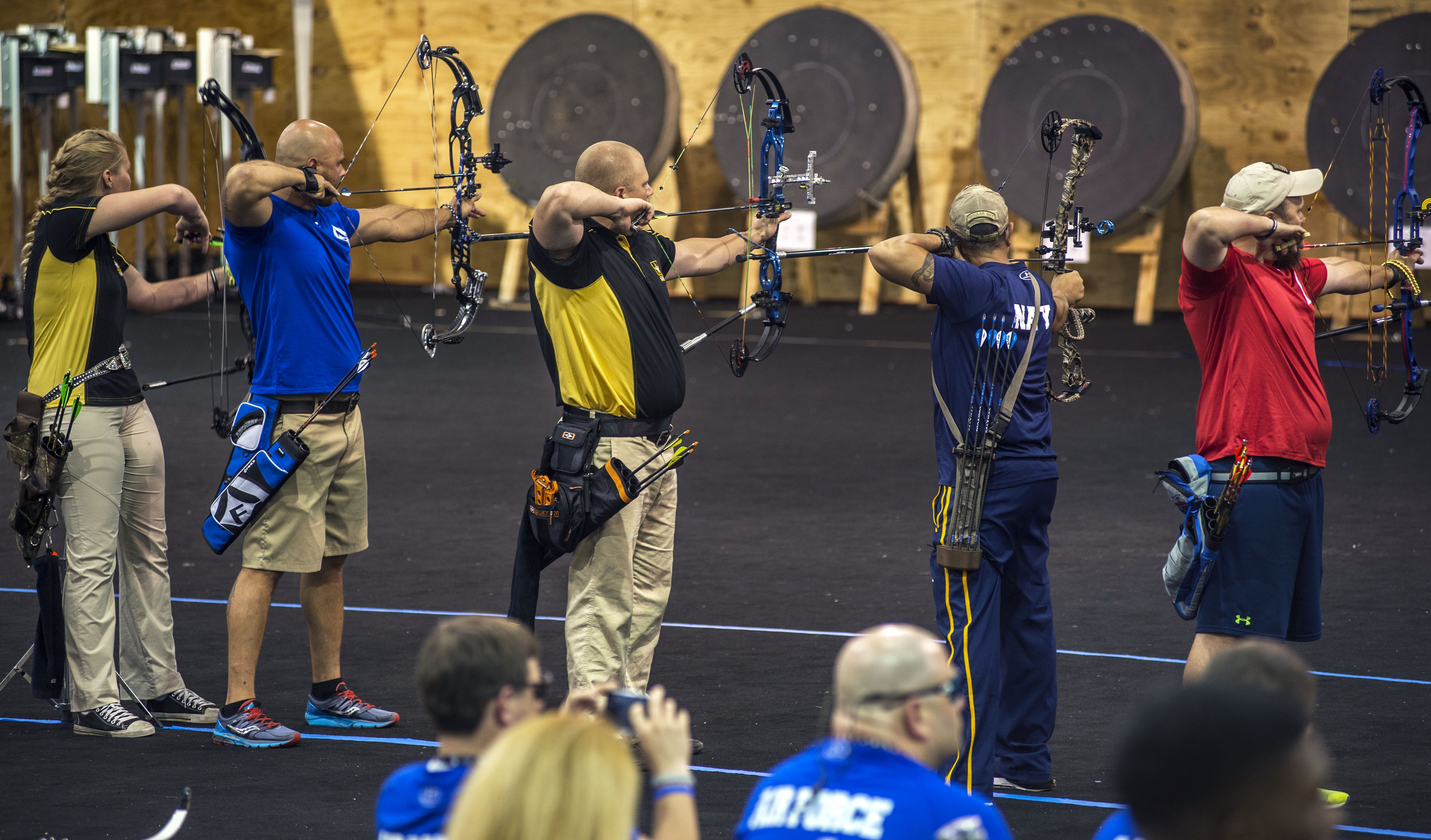 Participants prepare to take their shots at the 2015 Department of