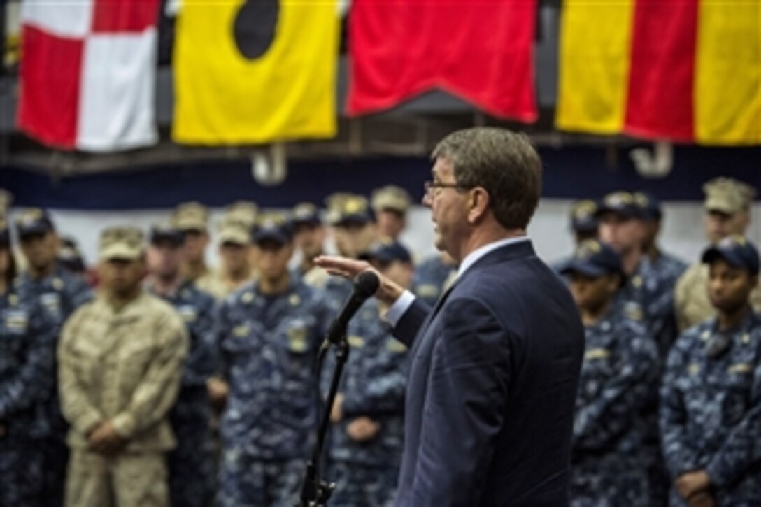U.S. Defense Secretary Ash Carter talks with U.S. sailors and Marines aboard the USS San Antonio  after the ship's arrival in Tallinn, Estonia, June 23, 2015. Carter is in Europe to meet with European defense ministers and participate in his first NATO ministerial as defense secretary.