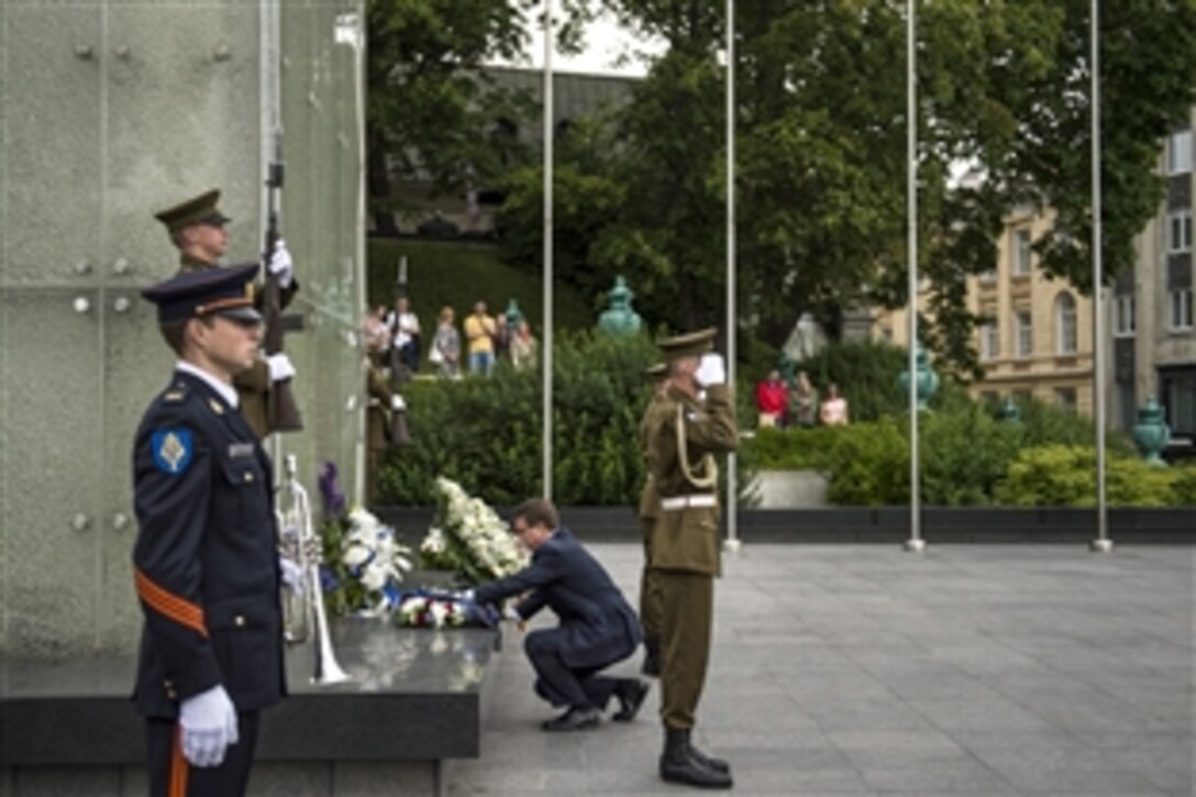 U.S. Defense Secretary Ash Carter participates in a wreath-laying ceremony at the War of Independence Victory Column in Tallinn, Estonia, June 23, 2015. Carter is in Europe to meet with European defense ministers and participate in his first NATO ministerial as defense secretary.