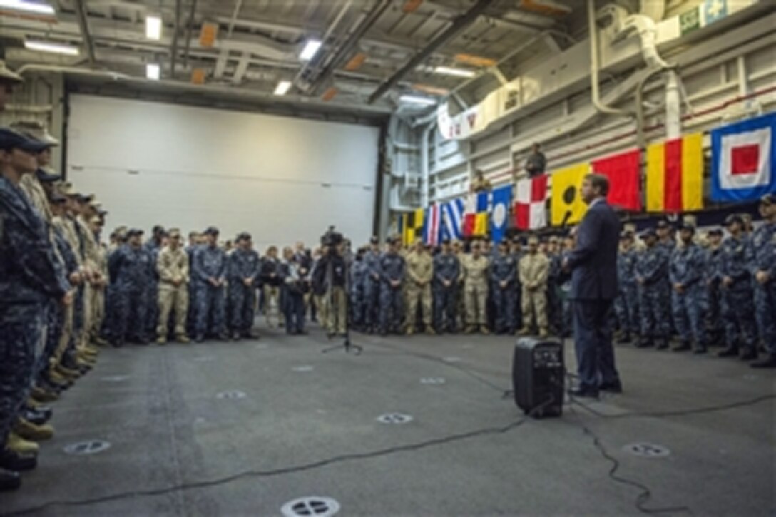 U.S. Defense Secretary Ash Carter talks with U.S. sailors and Marines aboard the USS San Antonio after the ship's arrival in Tallinn, Estonia, June 23, 2015. Carter is in Europe to meet with European defense ministers and participate in his first NATO ministerial as defense secretary.