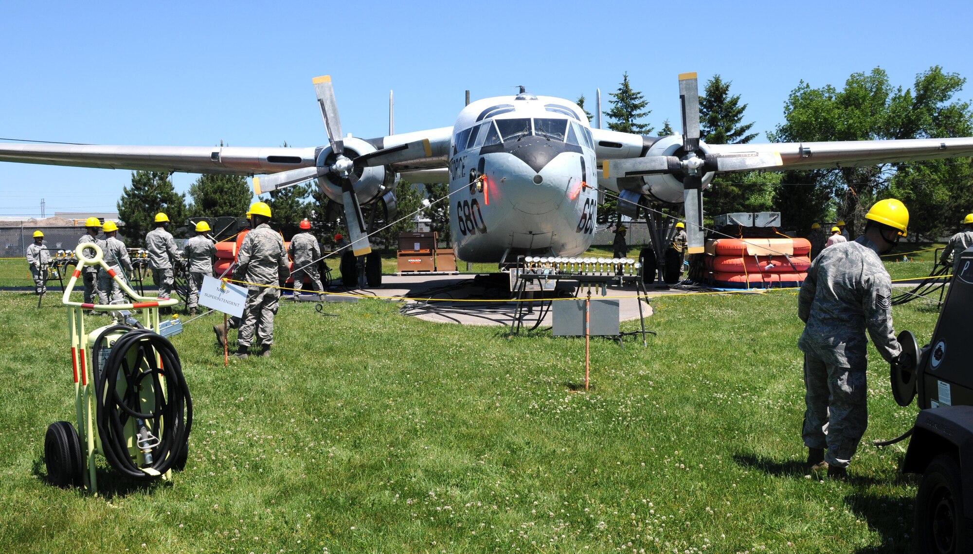 Personnel from the 914th Maintenance Squadron Crash Damaged and Disabled Aircraft Recover Team conduct a simulated crash and recovery exercise at the Niagara Falls Air Reserve Station, June 6, 2015. More than 20 personnel simulated a crash and recovery exercise and familiarized themselves with equipment and procedures. (U.S. Air Force photo by Staff Sgt. Matthew Burke)
