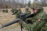 Canadian army soldiers from the 1st Battalion, Novia Scotia Highlanders (North), prepare to fire on a range at Fort Pickett, Va., Feb. 16, 2009.