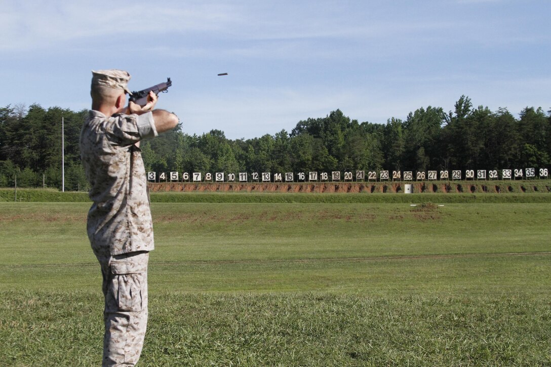 Lieutenant Gen. Mark A. Brilakis, Commanding General, Marine Corps Recruiting Command, fired the first round during the opening ceremony at the 54th Interservice Rifle Championship held at the Calvin A. Lloyd Complex, Quantico Va. The competition is hosted by Weapons Training Battalion and is scheduled to run from 24 June to 1 July and includes varoius individual and team competitions. The awards banquet announcing the winners will take place on 1 July at the Clubs at Quantico. 
