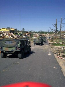 About 1,100 Alabama National Guard members are supporting civilian
authorities after tornadoes ravaged the state Wednesday.