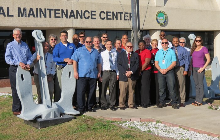 Scientists and engineers from across the NAVSEA enterprise pose for a group photo outside Southeast Regional Maintenance Center, which hosted the 2015 Fleet Integrated Sustainment Team conference in March.