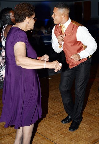 Marines from Marine Corps Logistics Base Albany and Marine Corps Logistics Command participate in the 12th annual Senior Citizens Prom held at the Albany James H. Gray Sr. Civic Center, June 19.  
The event is hosted by the Albany Recreation and Parks Department for area seniors as a way for them to enjoy themselves in a safe environment with their peers.  
"They look forward to this event every year and they love seeing the Marines and police officers who volunteer their time to escort and dance with them," said Tee Taylor, program coordinator. "We miss the Marines in their uniforms this year, but they still look good and you can still tell they are Marines."

