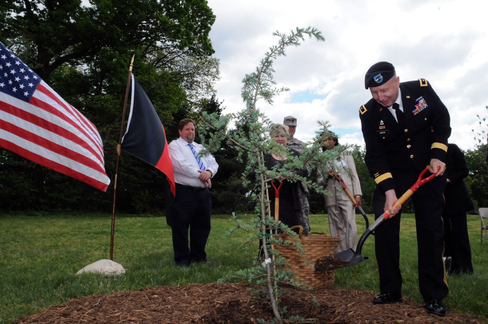 Army Maj. Gen. Darren Owens, special assistant to the director, Army
National Guard, helps plant a tree symbolizing cooperation between Afghan government officials and National Guard Agricultural Development Teams during a
ceremony at the National Arboretum in Washington, D.C
