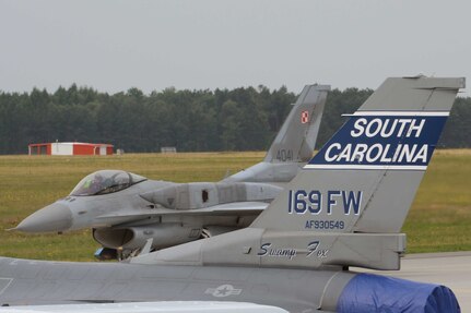 Polish F-16 fighter jets from the 32nd Tactical Air Wing leave Łask Air Base, Poland to participate in exercise Eagle Talon, June 16, 2015. U.S. Air Force Airmen from Spangdahlem Air Base, Germany and the South Carolina Air National Guard’s 169th Fighter Wing from McEntire Joint National Guard Base, are deployed to Łask Air Base in support of Operation Atlantic Resolve, during the month of June. 