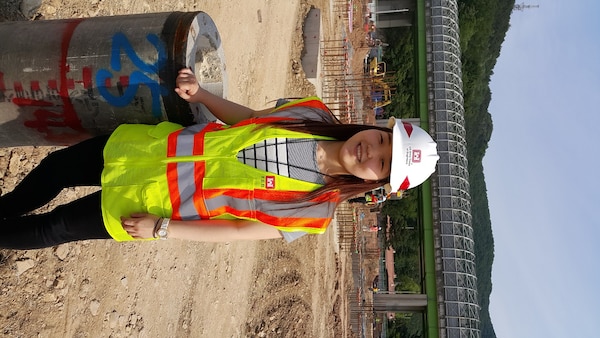 Gu Gui-young, a senior at Yeungnam University majoring in materials science and engineering and an intern at the Far East District’s southern resident, on site at the middle and high school project at Camp Walker. 