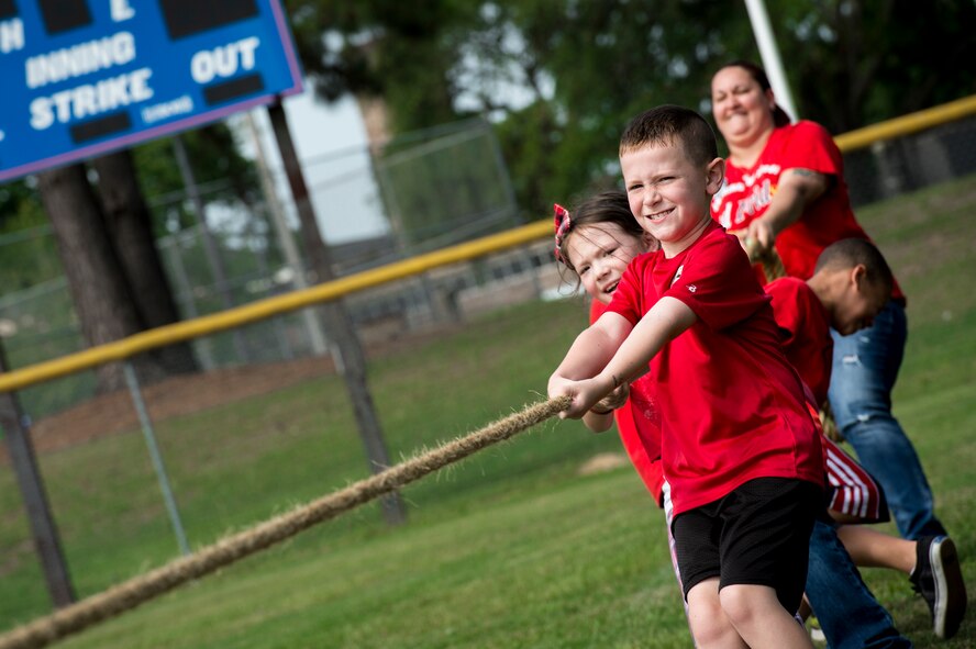 Members of Moody’s Youth Programs, compete in a tug-of-war during Olympic Day June 12, 2015, at Moody Air Force Base, Ga. Each June, more than 160 countries celebrate Olympic Day. (U.S. Air Force photo by Senior Airman Ryan Callaghan/Released)