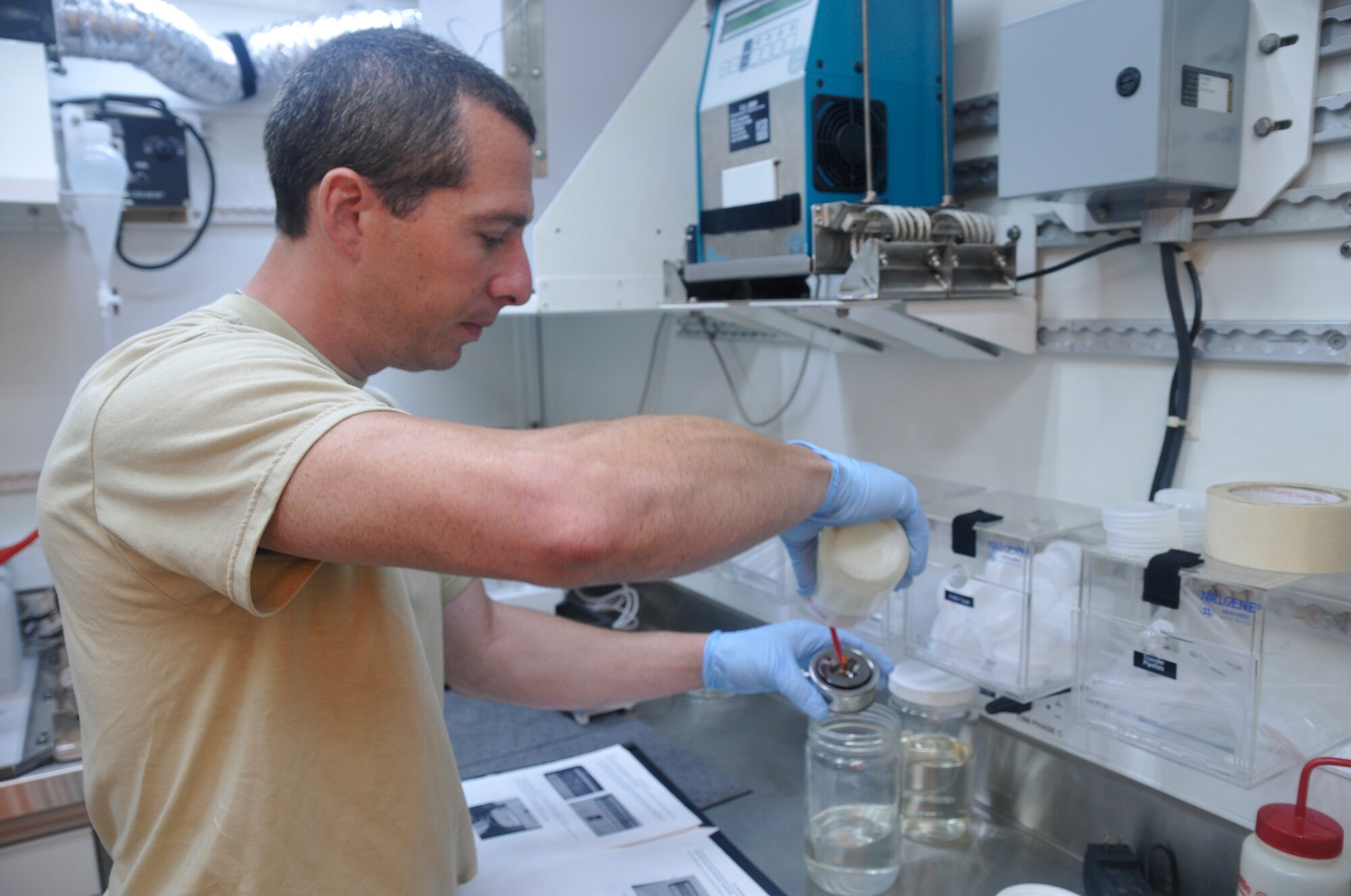 Army Reserve Pvt. Derek Taylor, a petroleum lab specialist with the 308th Quartermaster Detachment out of Scottsburg, Ind., completes a flashpoint test of fuel for Combat Support Training Exercise Global Lightning and Quartermaster Liquid Logistics Exercise June 16, 2015 at Joint Base McGuire-Dix Lakehurst, N.J. (Photo By Spc. Samuel Al-Nimri)