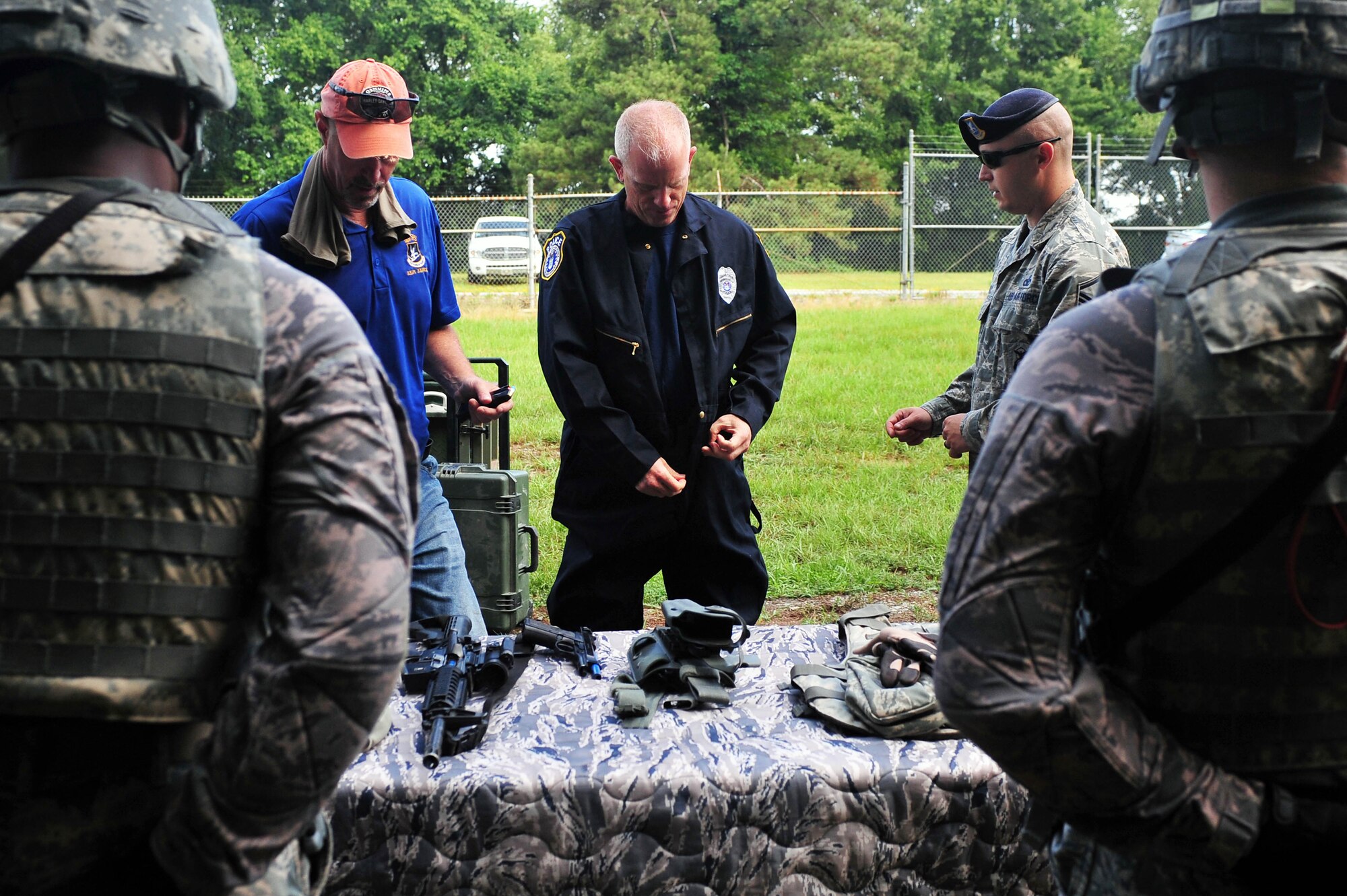 Chief Master Sgt. Frank Batten, Ninth Air Force command chief, dons protective gear for a training exercise at Seymour Johnson Air Force Base, North Carolina, June 19, 2015. The exercise was conducted at the 4th Security Forces Squadron range training complex or “shoot house” which provides a realistic training environment for Airmen. (U.S. Air Force photo by Senior Airman John Nieves Camacho/Released)