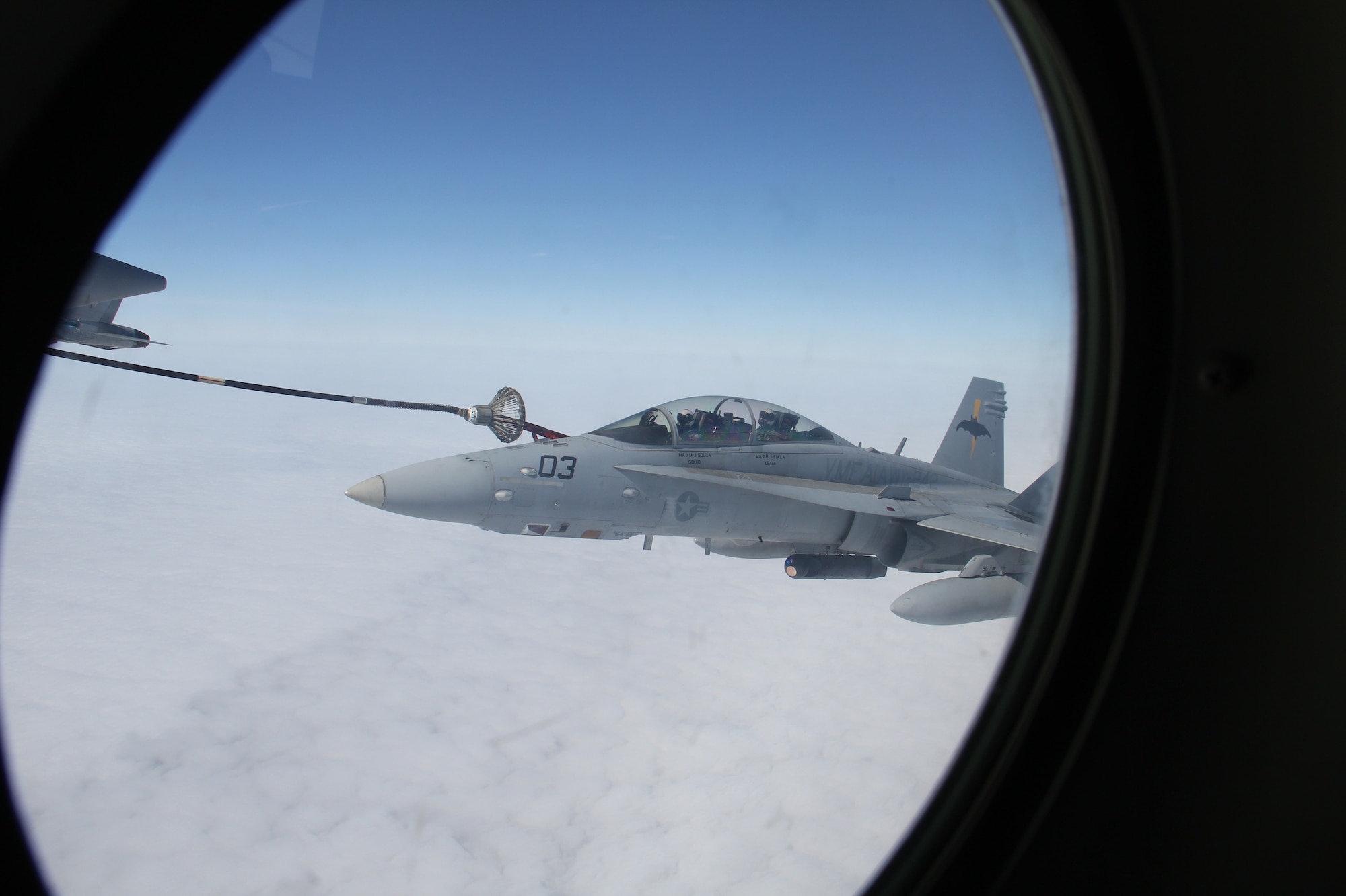 A U.S. Navy F/A-18F Super Hornet of Air Test Squadron (VX) 9, China Lake, Calif., takes fuel from a U.S. Marine Corps KC-130J stationed in Iwakuni, Japan over the Gulf of Alaska while participating in Exercise Northern Edge June 22, 2015. Over 200 military aircraft from all services practiced operations, techniques and procedures while simultaneously enhancing interoperability during Exercise Northern Edge 2015 – Alaska’s premier joint training exercise. (U.S. Navy photo by Lt. Edward Cartagena)