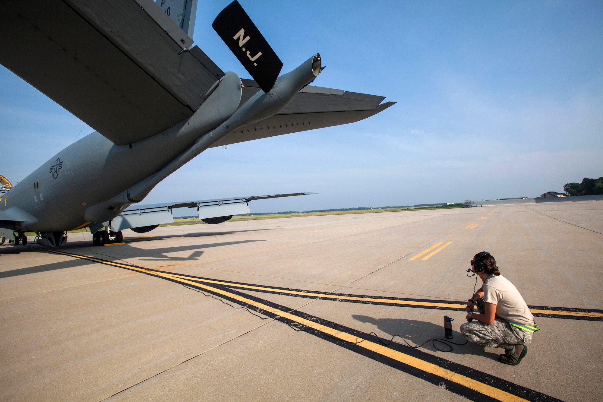 Senior Airman Ashley V. Chytraus, a crew chief with the 108th Wing, New Jersey Air National Guard, verifies that the rudders and flaps are operable on a KC-135R Stratotanker for a training flight at Joint Base McGuire-Dix-Lakehurst, N.J., June 11, 2015. Chytraus was in a motorcycle accident June 21, 2014. The collision broke two vertebrae in Chytraus’s neck, crushed her hand, mangled the quadriceps tendon in her leg, forced two splintered ribs into her liver and fractured her elbow. In addition, she died while being medevaced to the hospital. 358 days later, she passed all portions of the Air Force Physical Fitness Test and received  an excellent. (U.S. Air Force photo by Master Sgt. Mark C. Olsen/Released)