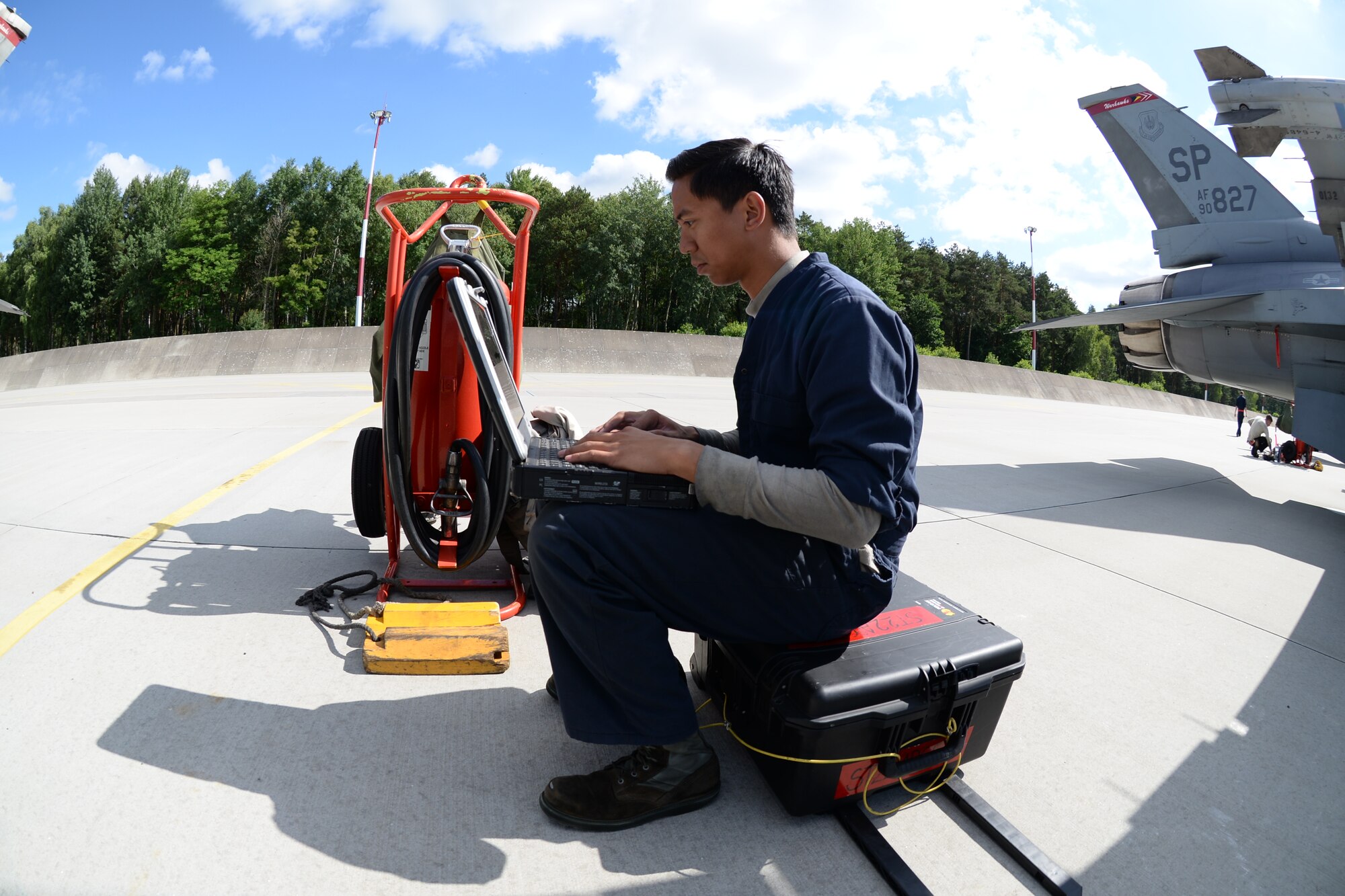 U.S. Air Force Airmen from South Carolina Air National Guard's 169th Fighter Wing and the 52nd  Fighter Wing from Spangdahlem Air Base in Germany prepare F-16 Fighting Falcon fighter aircraft to participate in exercise Eagle Talon at Łask Air Base, Poland, June 16, 2015. U.S. Airmen from Spangdahlem Air Base, Germany and the South Carolina Air National Guard’s 169th Fighter Wing from McEntire Joint National Guard Base, are deployed to Łask Air Base in support of Operation ATLANTIC RESOLVE, during the month of June. These training missions, called Aviation Detachment Rotations, pair U.S. fighter pilots and maintenance crews with their Polish air force counterparts at Łask Air Base. This bilateral training, hosted by permanently assigned U.S. service members assigned to Poland, has taken place since 2012. Through strengthened relationships and engagements with our allies, the U.S. and NATO demonstrate their shared commitment to a peaceful, stable and secure Europe. (U.S. Air Force photo by Senior Master Sgt. Wesley Fleming /Released)
