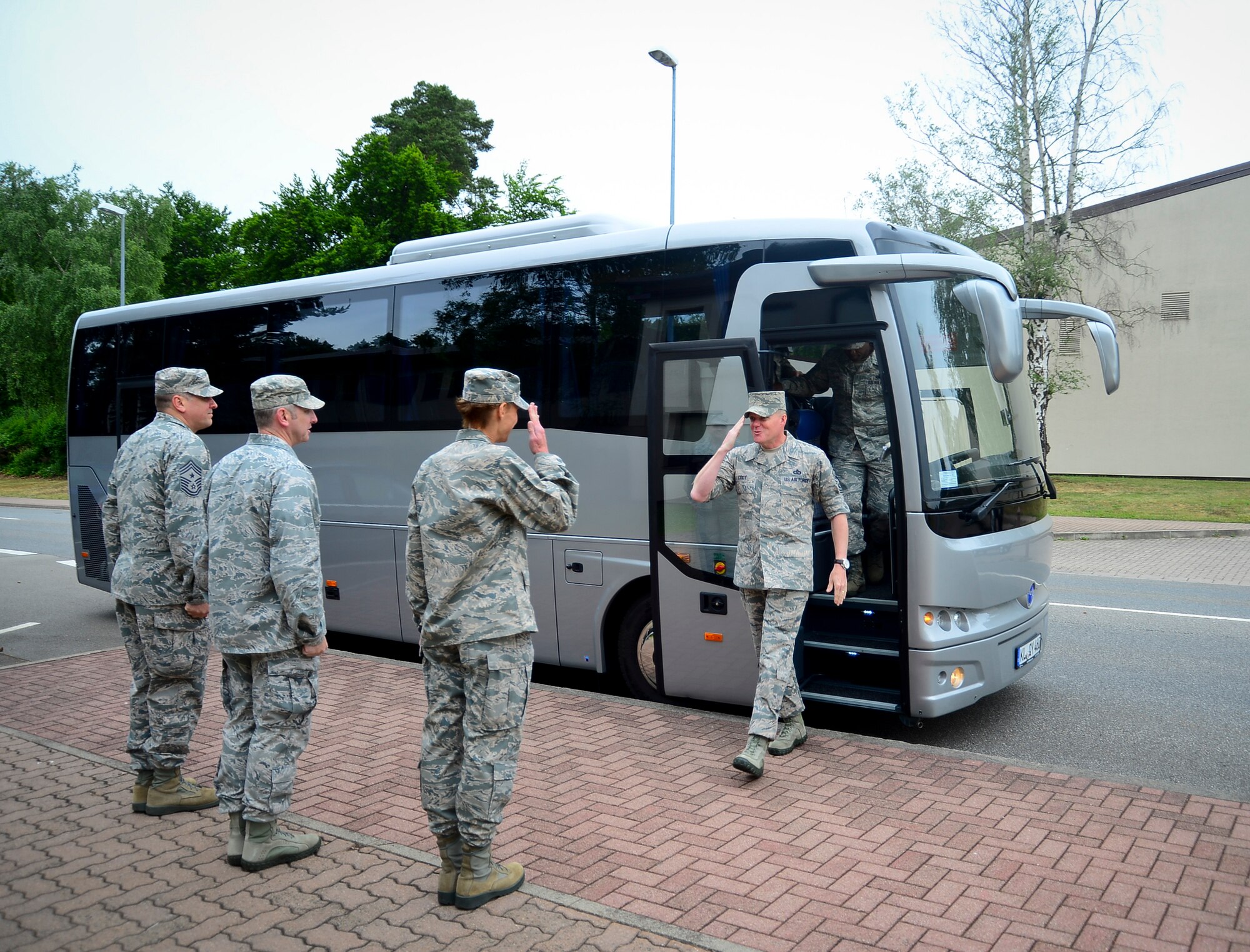 Col. Andra Kniep, 435th Air Ground Operations Wing and 435th Air Expeditionary Wing commander, greets Chief Master Sgt. of the Air Force James A. Cody during his visit June 22, 2015, to Ramstein Air Base, Germany.  Cody received a hands-on tour of the AGOW’s facilities and the wing’s mission brief.  (U.S. Air Force photo/Tech. Sgt. Daylena S. Ricks)