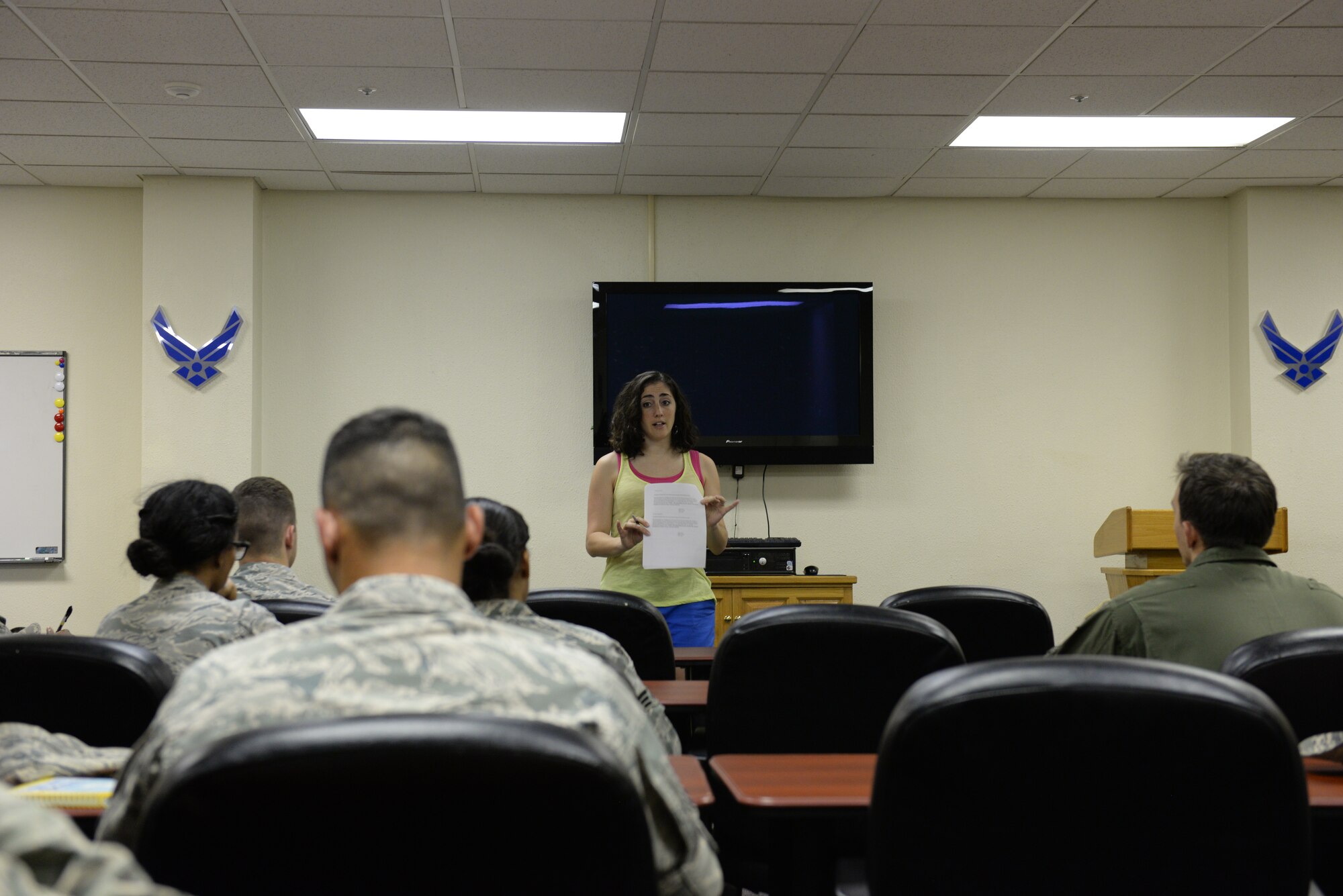Katie Evans, former U.S. Air Force captain and 18th Force Support Squadron manpower and personnel flight commander, speaks to a group of commissioned and enlisted Airmen on Kadena Air Base, June 18, 2015. She spoke about her experience applying for the career intermission program. Evans was one of 20 officers selected for the program throughout the entire Air Force. (U.S. Air Force photo by Senior Airman Omari Bernard)