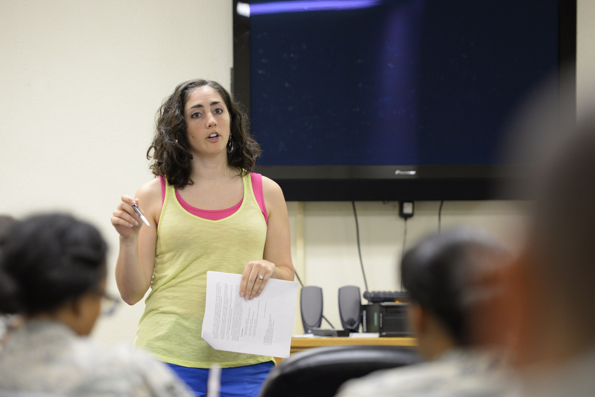 Katie Evans, former U.S. Air Force captain and 18th Force Support Squadron manpower and personnel flight commander, gives a briefing about the career intermission program on Kadena Air Base, Japan, June 18, 2015. The CIP offers Airmen the opportunity to take a sabbatical from their Air Force career in return for twice the amount of months taken. (U.S. Air Force photo by Senior Airman Omari Bernard)