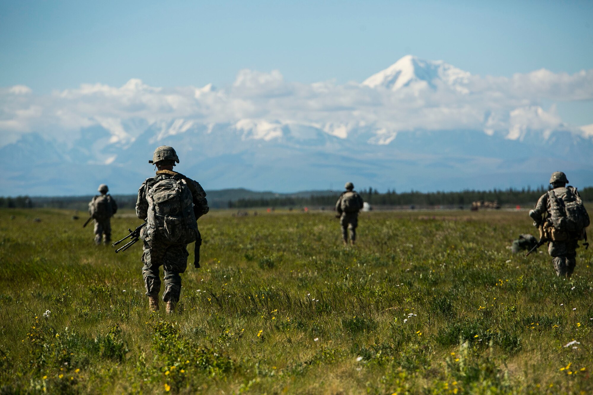 EIELSON AIR FORCE BASE, Alaska – U.S. Army combat engineers with the 6th Brigade Engineer Battalion, 4th Brigade Combat Team (Airborne), 25th Infantry Division, seize Allen Army Airfield and begin clearing the airfield in preparation for engineers to begin runway repairs at Fort Greely, Alaska, during Exercise Northern Edge, June 17, 2015. Northern Edge 2015 is Alaska’s premier joint training exercise designed to practice operations, techniques and procedures as well as enhance interoperability among the services. Thousands Airmen, Soldiers, Sailors, Marines and Coast Guardsmen from active duty, reserve and National Guard units are involved. (U.S. Marine Corps photo by Cpl. Tyler S. Giguere/Released)