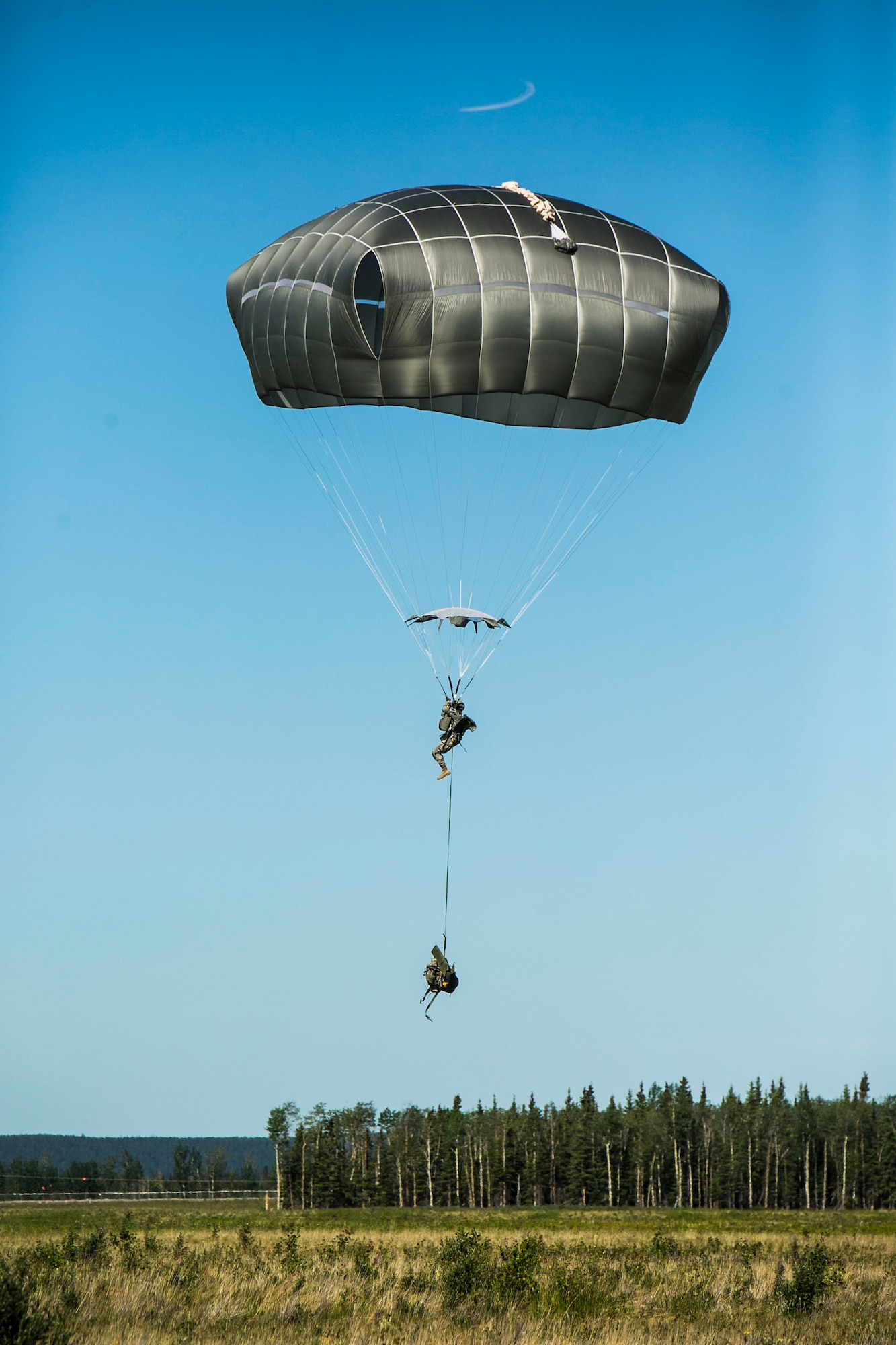 EIELSON AIR FORCE BASE, Alaska – An engineers with the 6th Brigade Engineer Battalion, 4th Brigade Combat Team (Airborne), 25th Infantry Division, parachute into Allen Army Airfield at Fort Greely, Alaska, as part of Exercise Northern Edge, June 17, 2015. Northern Edge 2015 is Alaska’s premier joint training exercise designed to practice operations, techniques and procedures as well as enhance interoperability among the services. Thousands Airmen, Soldiers, Sailors, Marines and Coast Guardsmen from active duty, reserve and National Guard units are involved. (U.S. Marine Corps photo by Cpl. Tyler S. Giguere/Released)