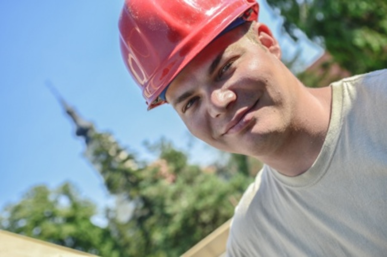 Army Spc. Robert Matz, a carpenter and masonry specialist, worked with members of his Minnesota National Guard unit and Croatian army troops to rebuild a roof on a village community center in Croatia. Matz is with the 851st Vertical Engineering Company from the Camp Ripley Training Center. Minnesota Air National Guard photo by Tech. Sgt. Lynette Olivares