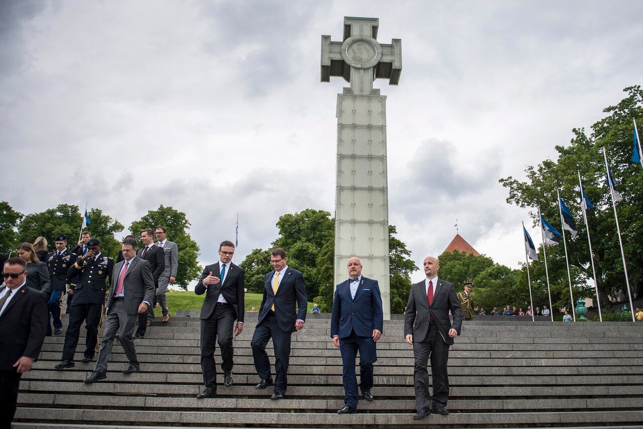 U.S. Defense Secretary Ash Carter, second from left, departs the War of Independence Victory Column with Estonian Defense Minister Sven Mikser, left, Lithuanian Defense Minister Juozas Olekas, second from right, and Latvian Defense Secretary Janis Sarts after participating in a wreath-laying ceremony in Tallinn, Estonia, June 23, 2015. DoD photo by U.S. Air Force Master Sgt. Adrian Cadiz