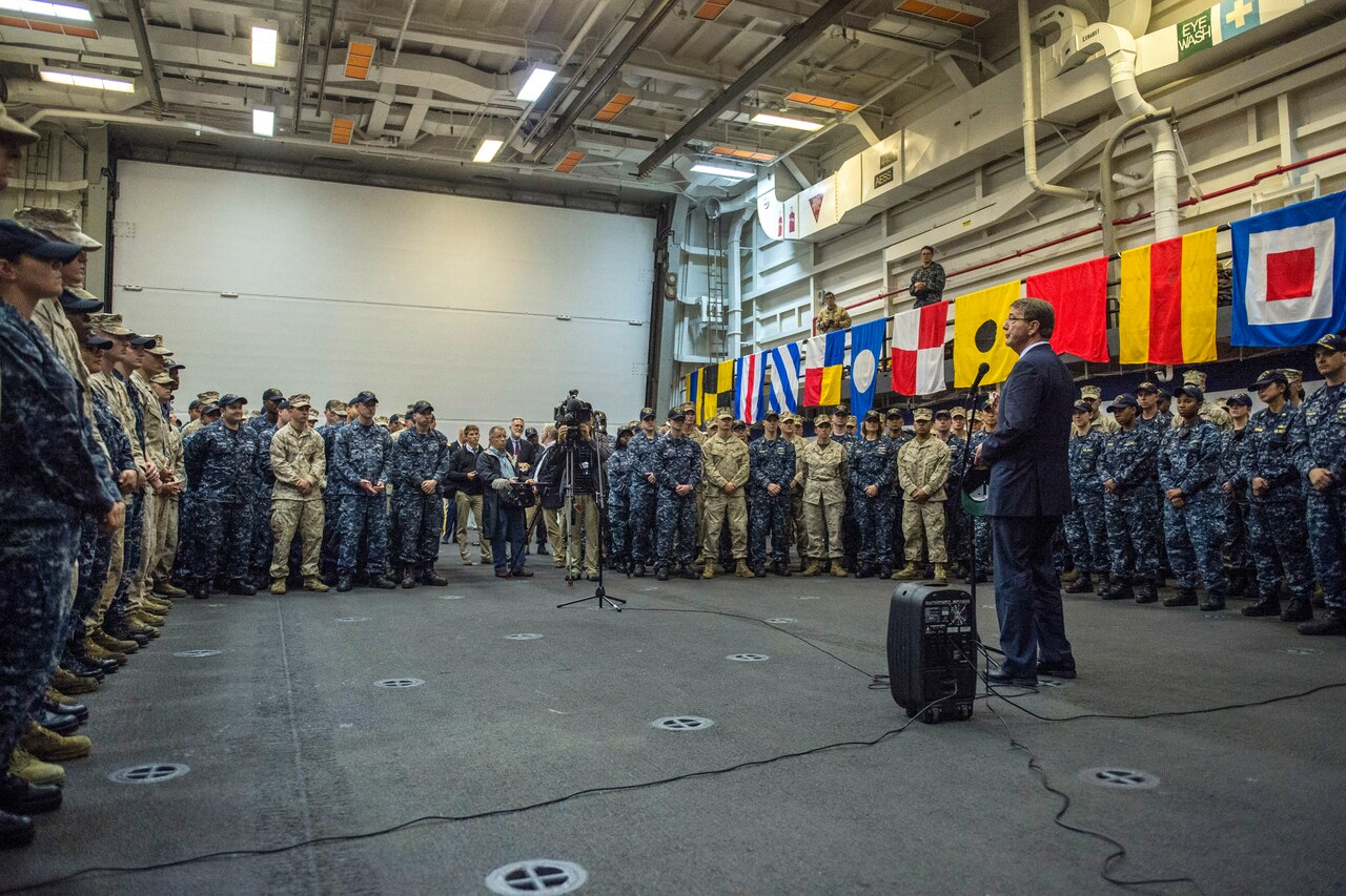 U.S. Defense Secretary Ash Carter talks with U.S. sailors and Marines aboard the USS San Antonio after the ship's arrival in Tallinn, Estonia, June 23, 2015. Carter is in Europe to meet with European defense ministers and participate in his first NATO ministerial as defense secretary. DoD photo by U.S. Air Force Master Sgt. Adrian Cadiz